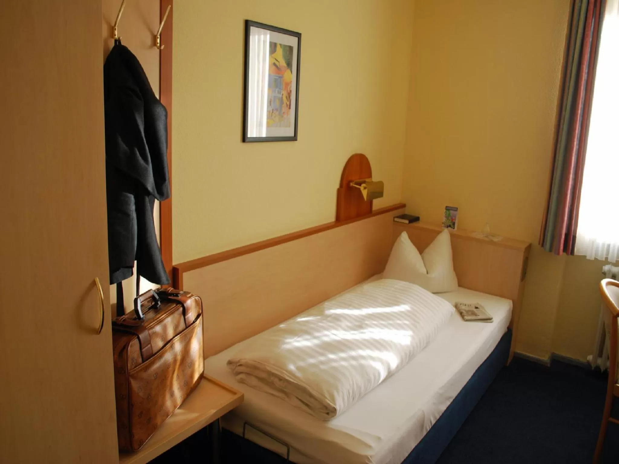 Bed in City Partner Hotel Strauss