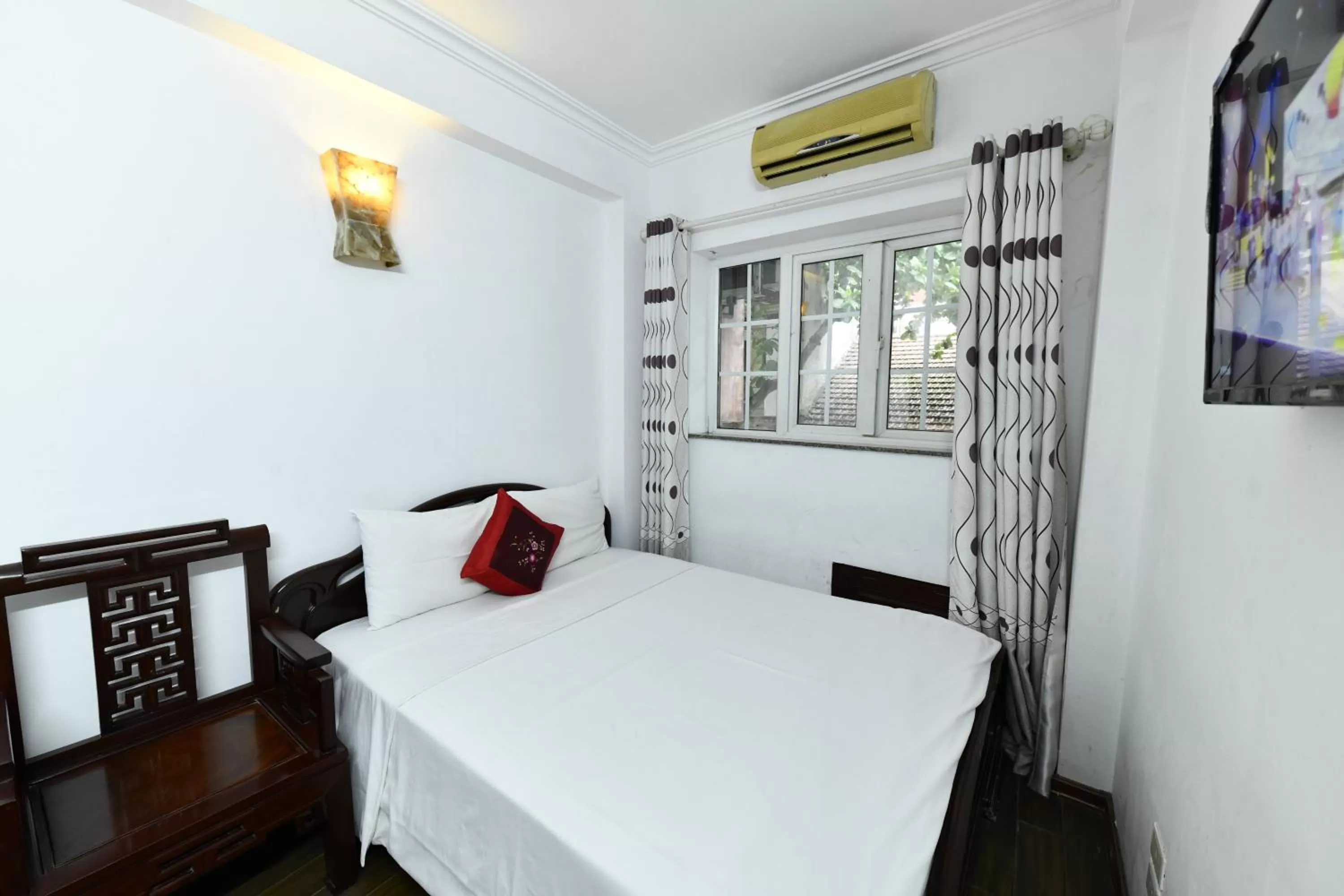 Bed in Phoenix Legend Hotel Hanoi