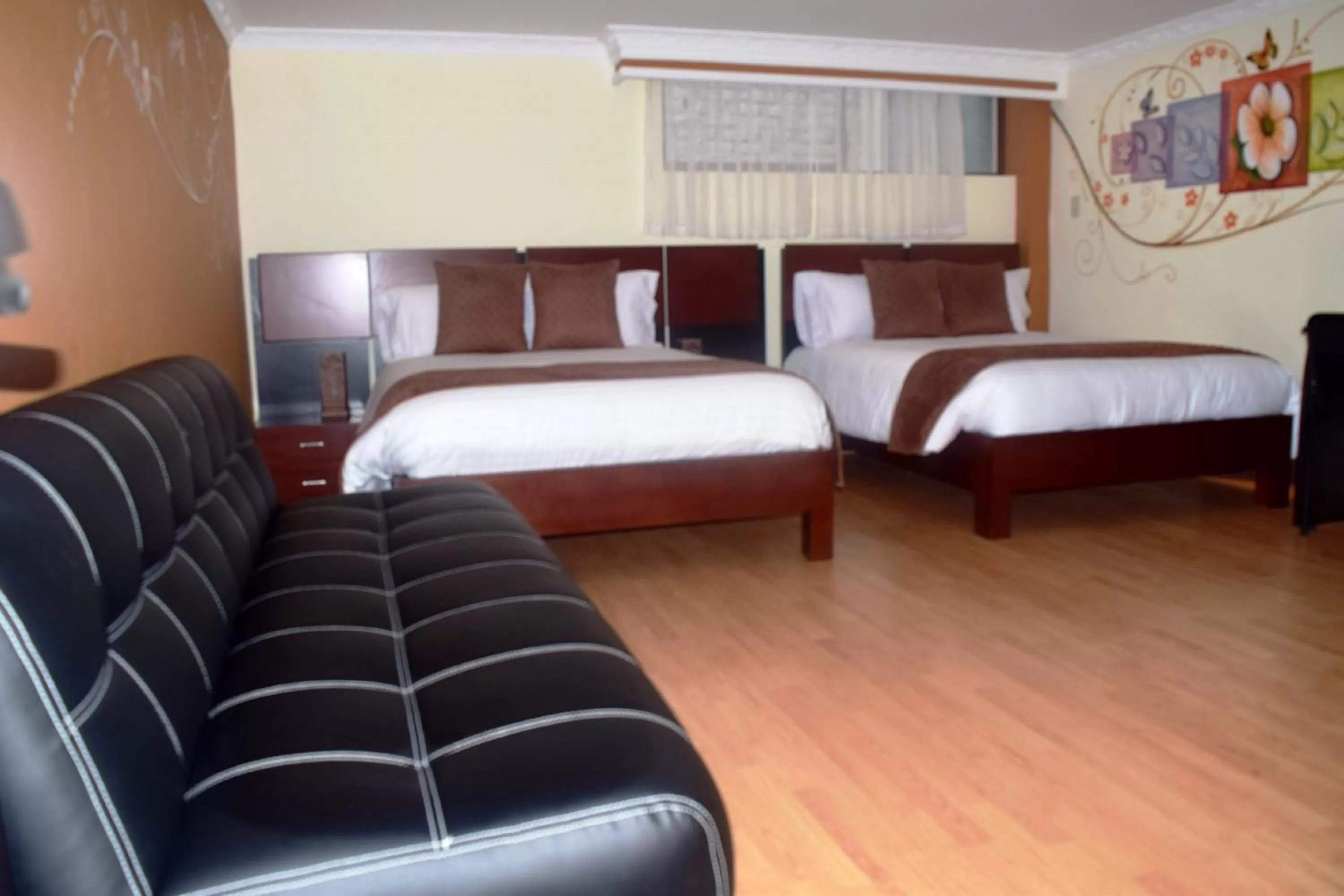 Bedroom in La Kapital Hotel