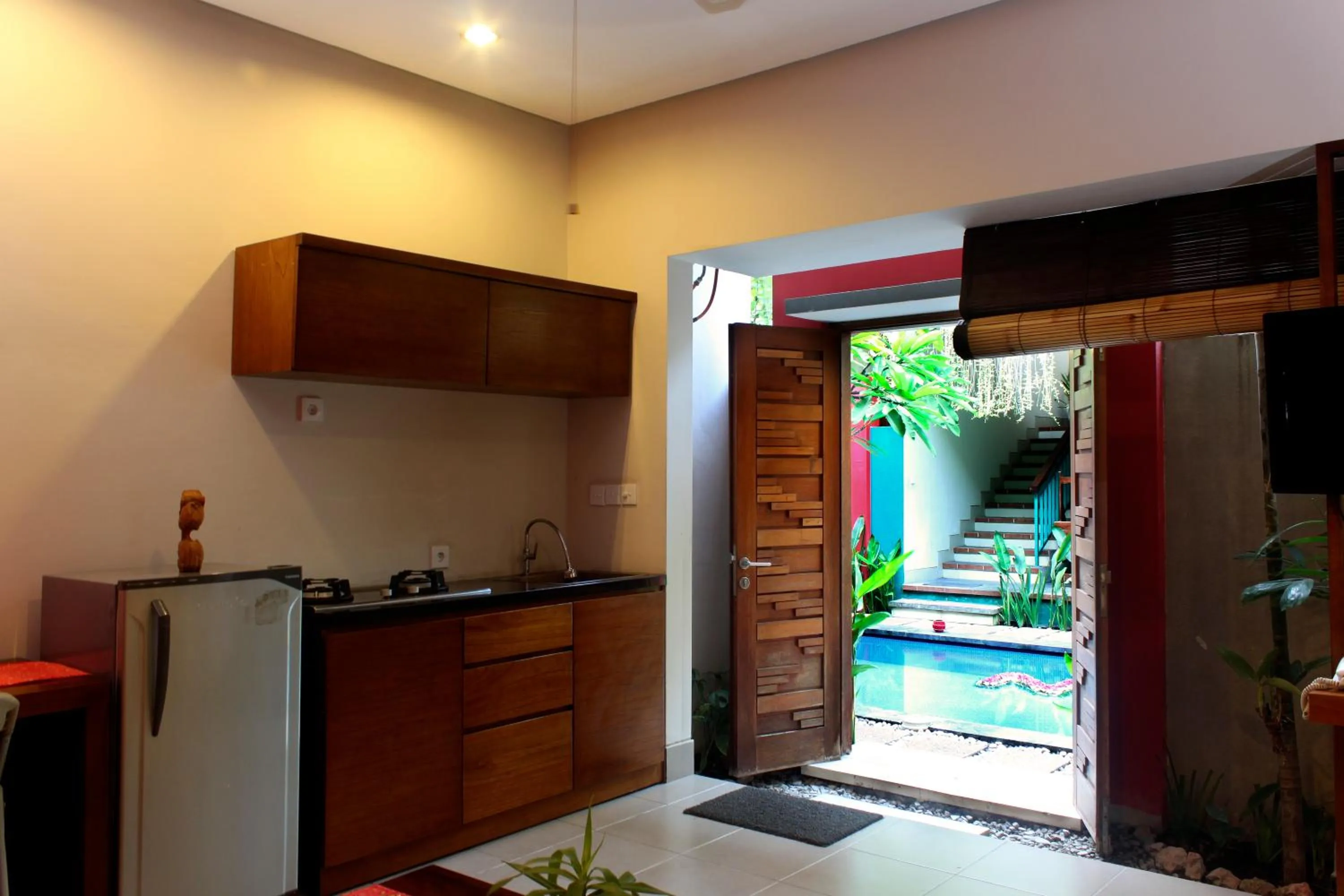 Kitchen or kitchenette in The Green Zhurga Suite Seminyak