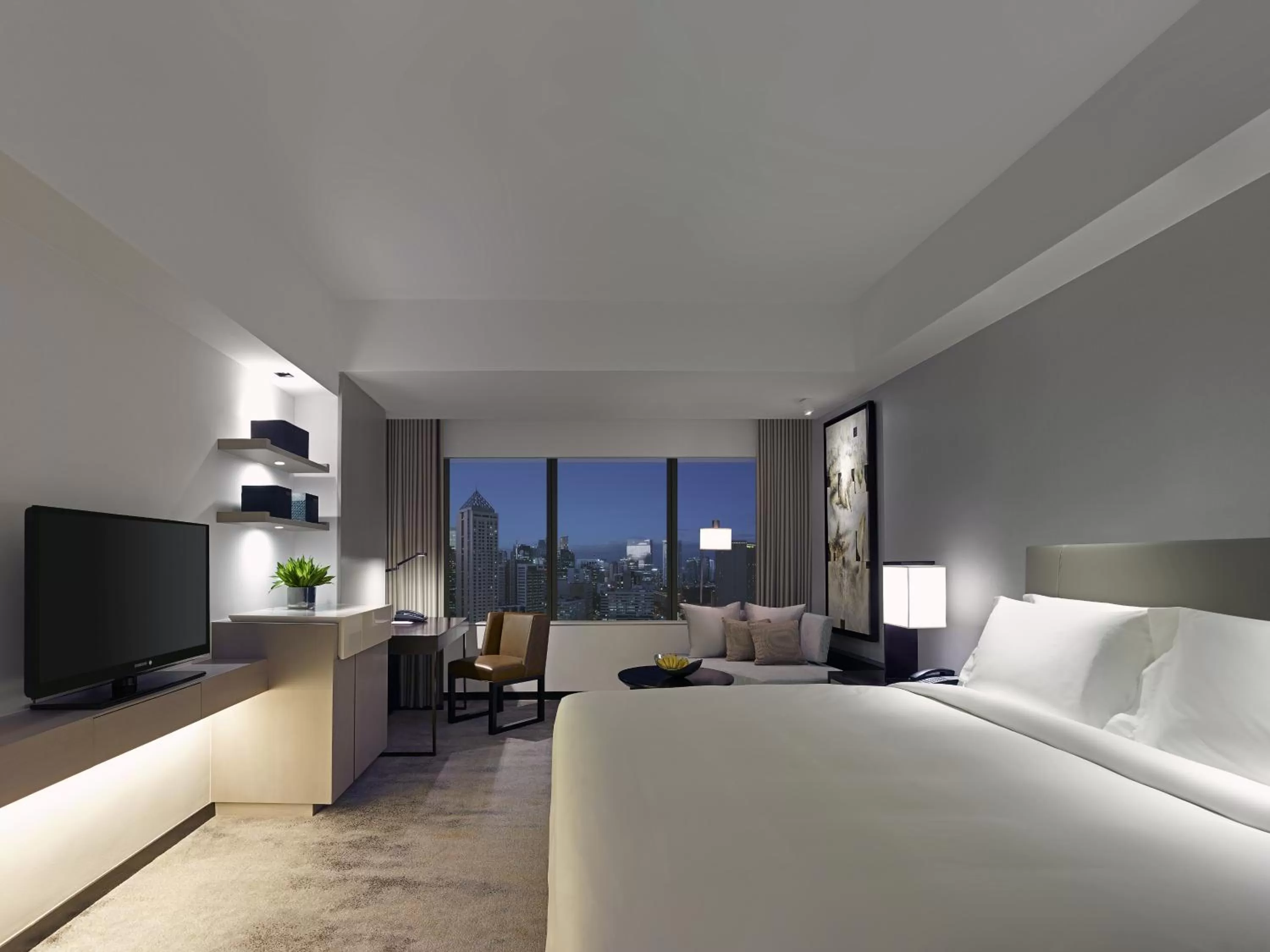 Bed in New World Makati Hotel, Manila