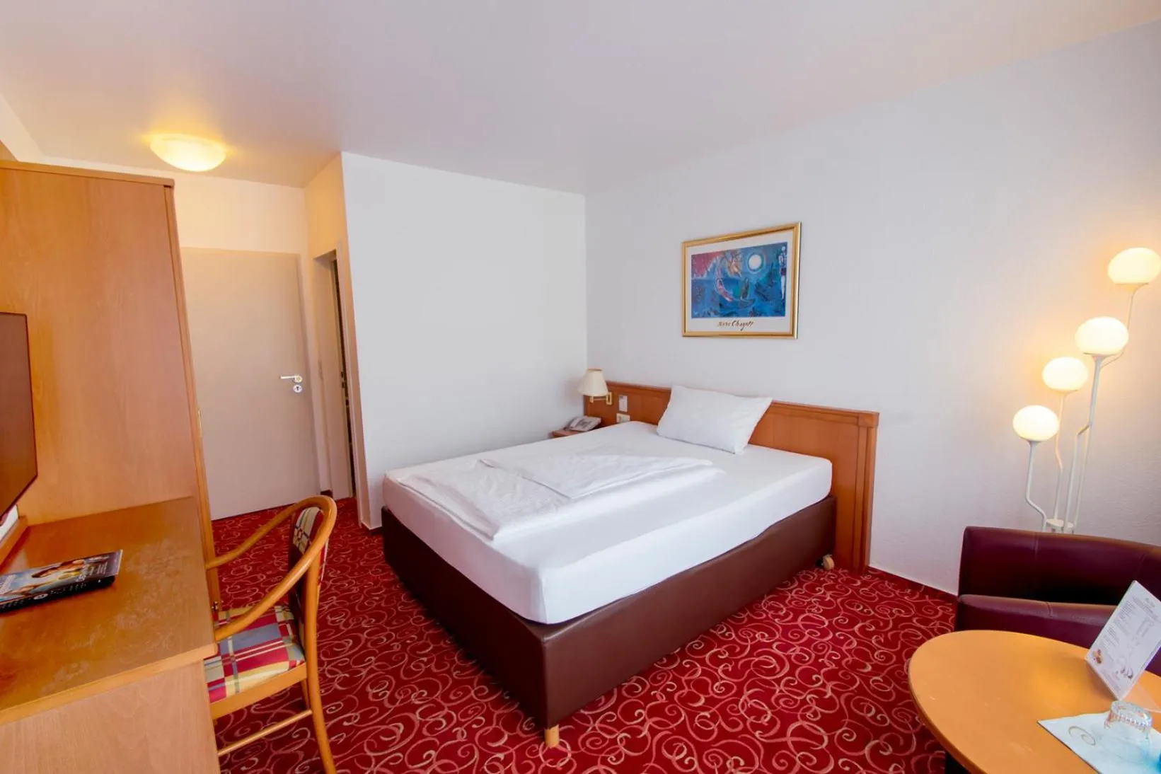 Bed in Caravelle Hotel im Park