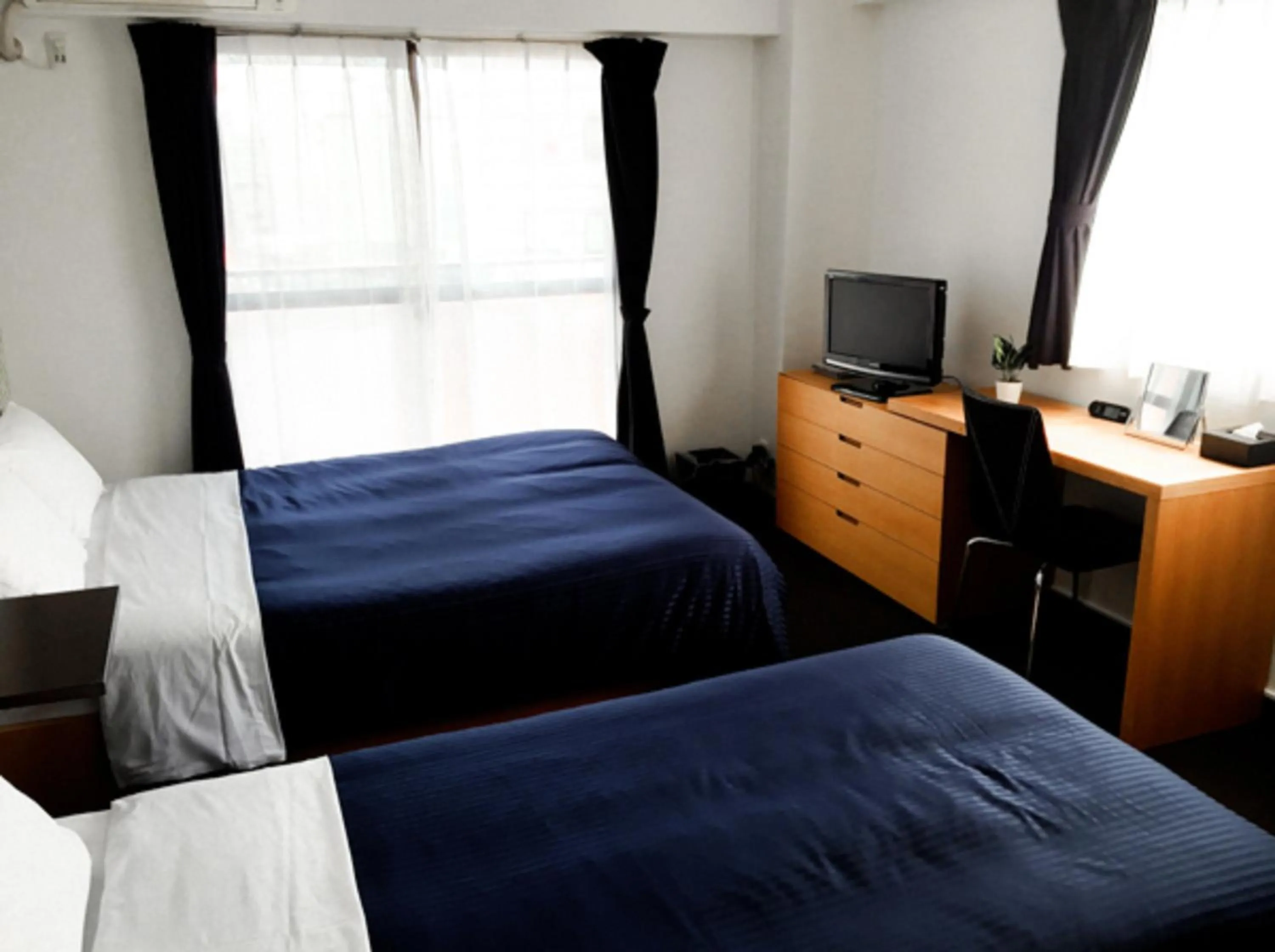 Bed in HOTEL LiVEMAX BUDGET Fuchu