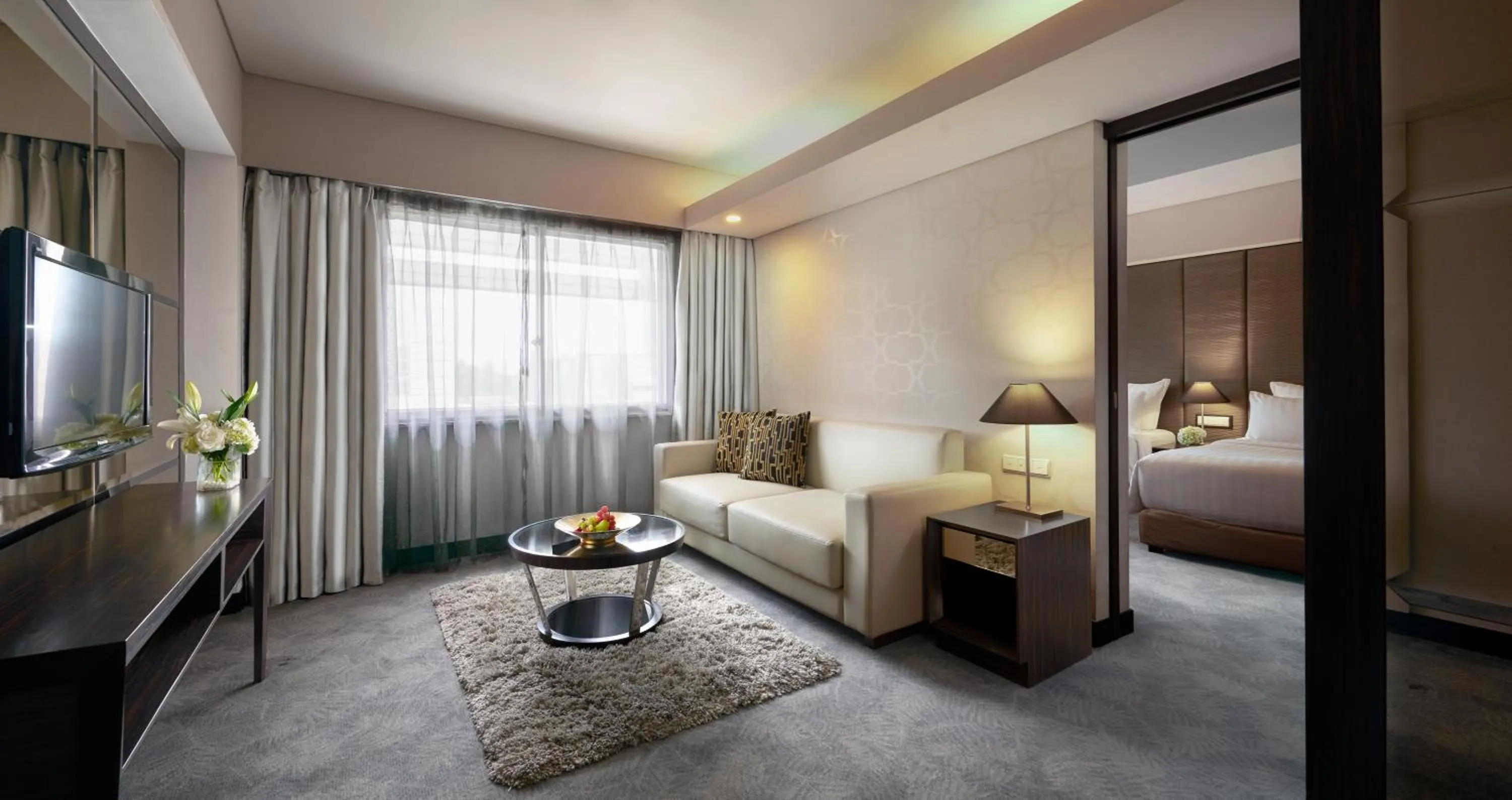 Living room, Bed in Pullman Jakarta Indonesia