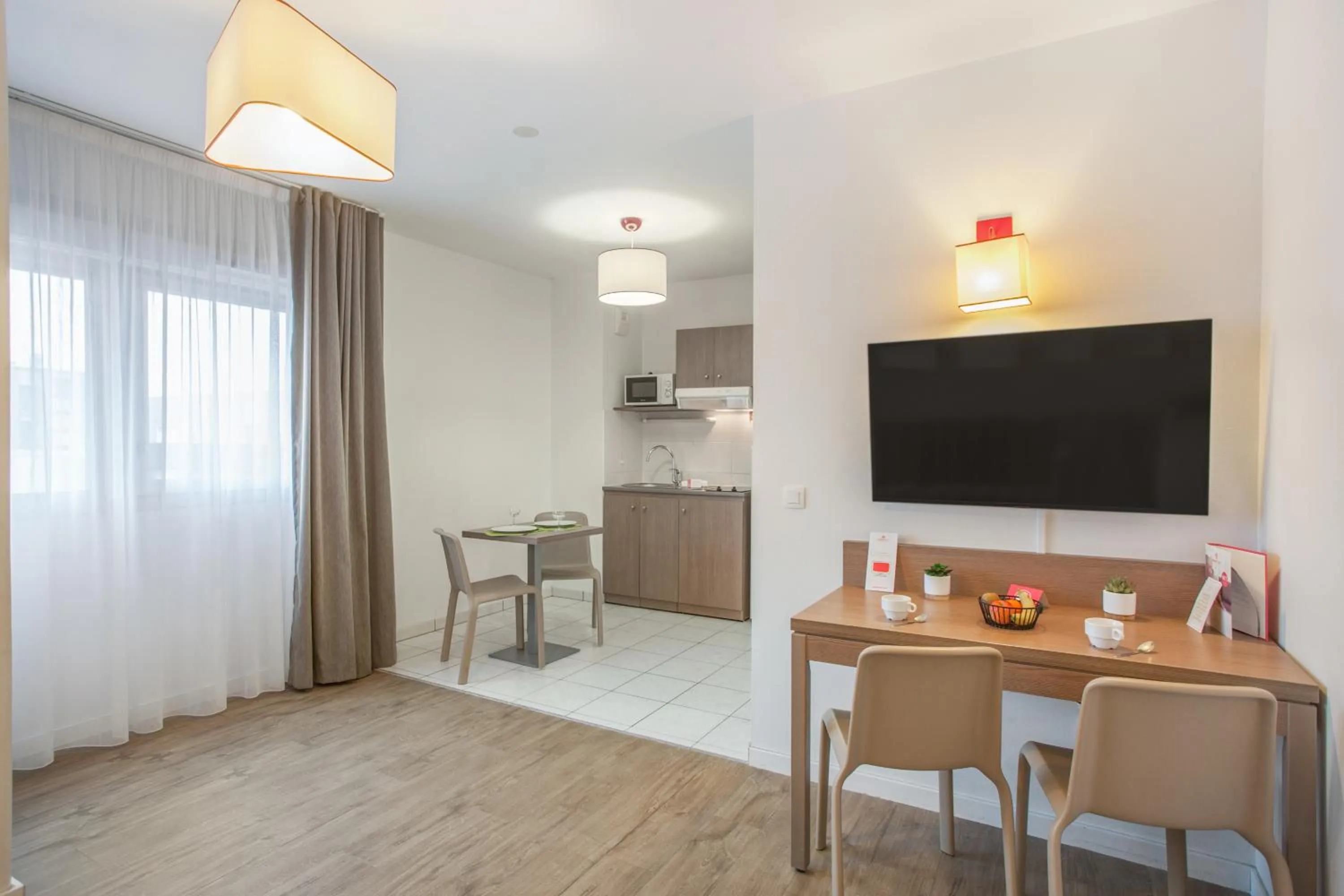 TV and multimedia in Appart'City Classic Annemasse Centre - Pays de Genève