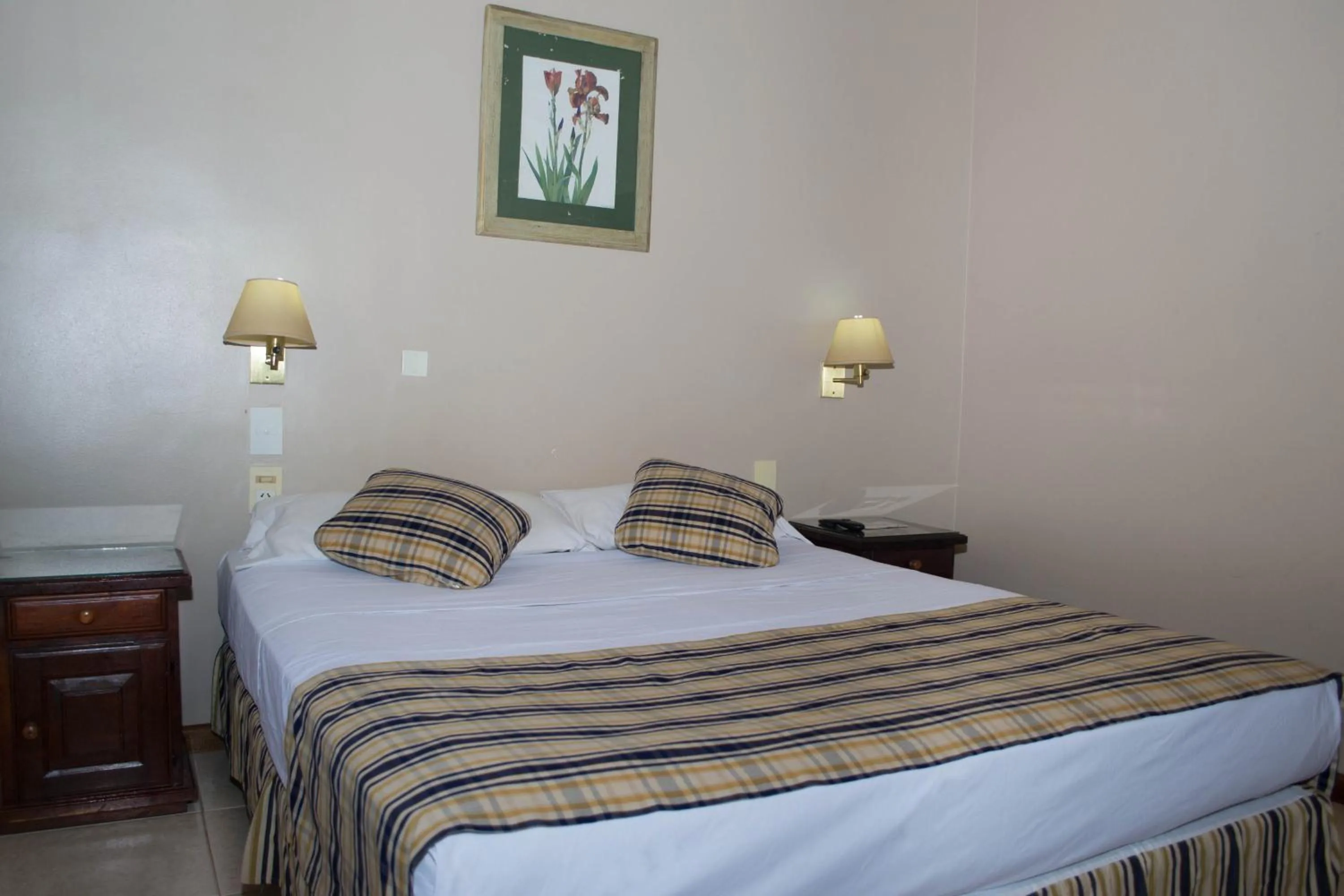 Bed in Marcopolo Suites Iguazu