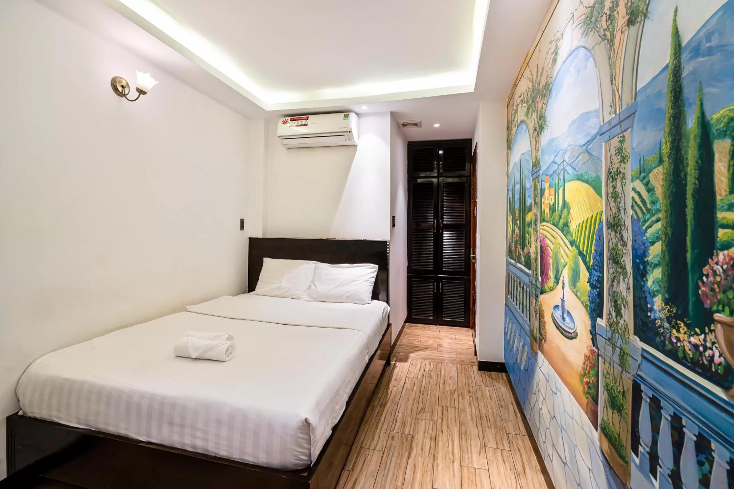 Bed in Lotus Laverne Hotel