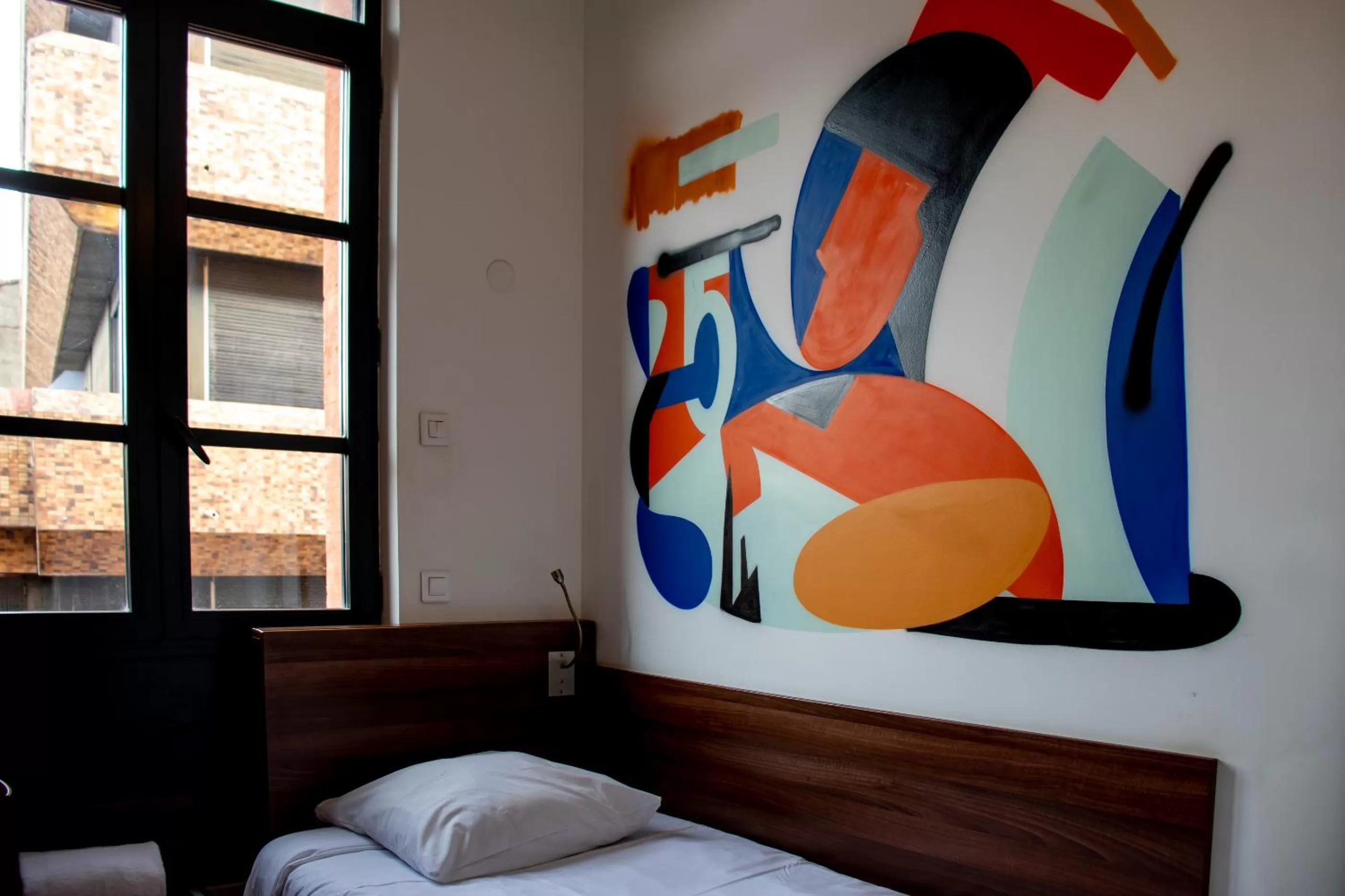 Photo of the whole room, Bed in Hôtel le Pastel