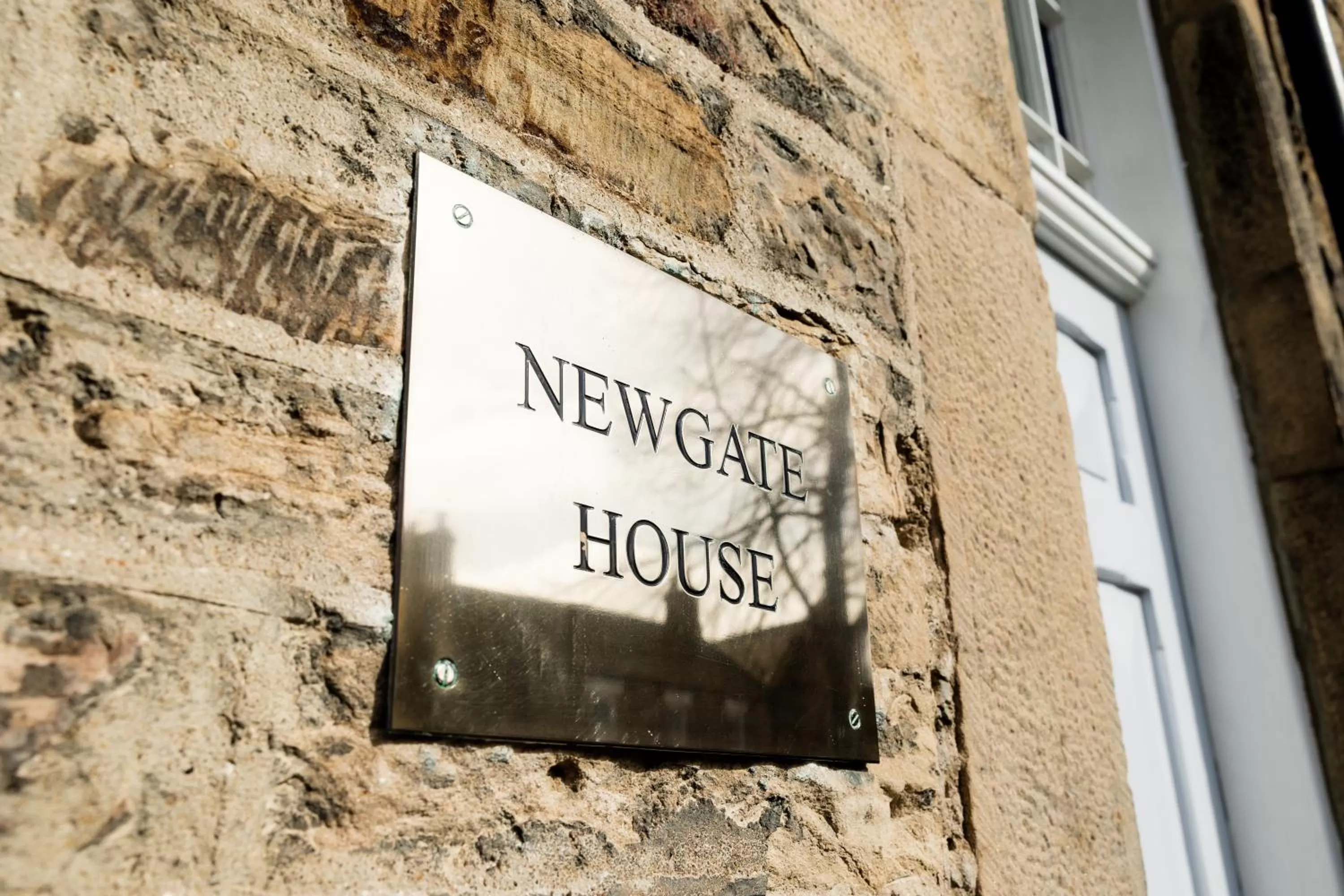 Property logo or sign in Newgate House