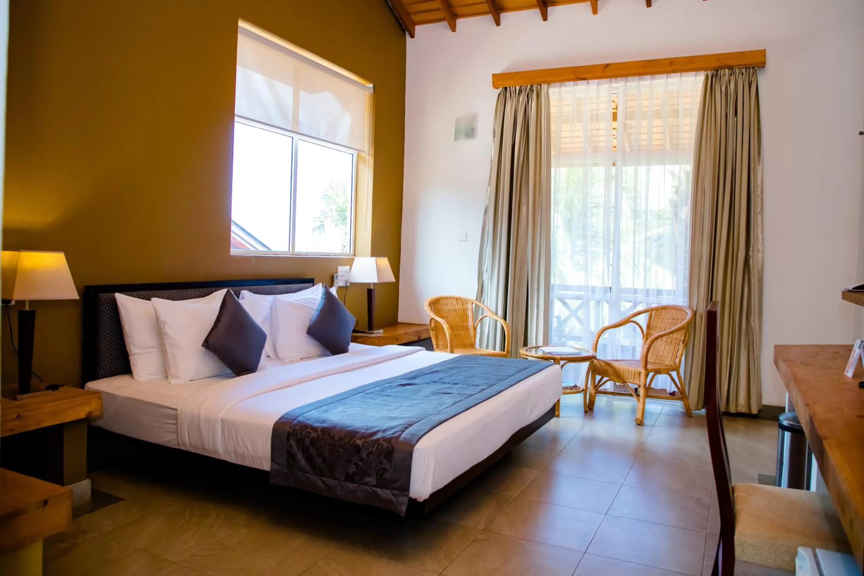 Balcony/Terrace, Bed in Amaranthe Bay Resort & Spa
