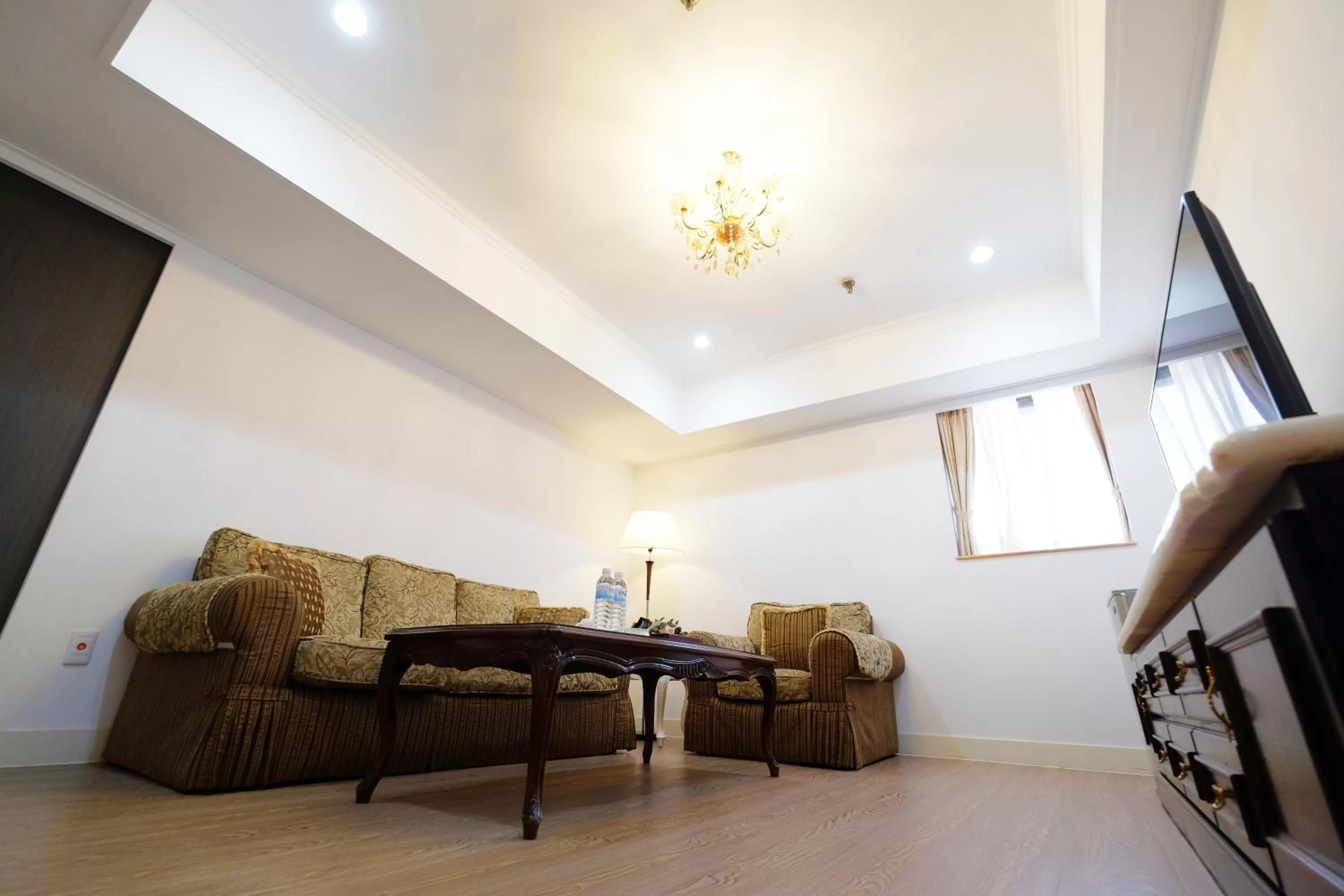 Living room in Dynasty Hotel