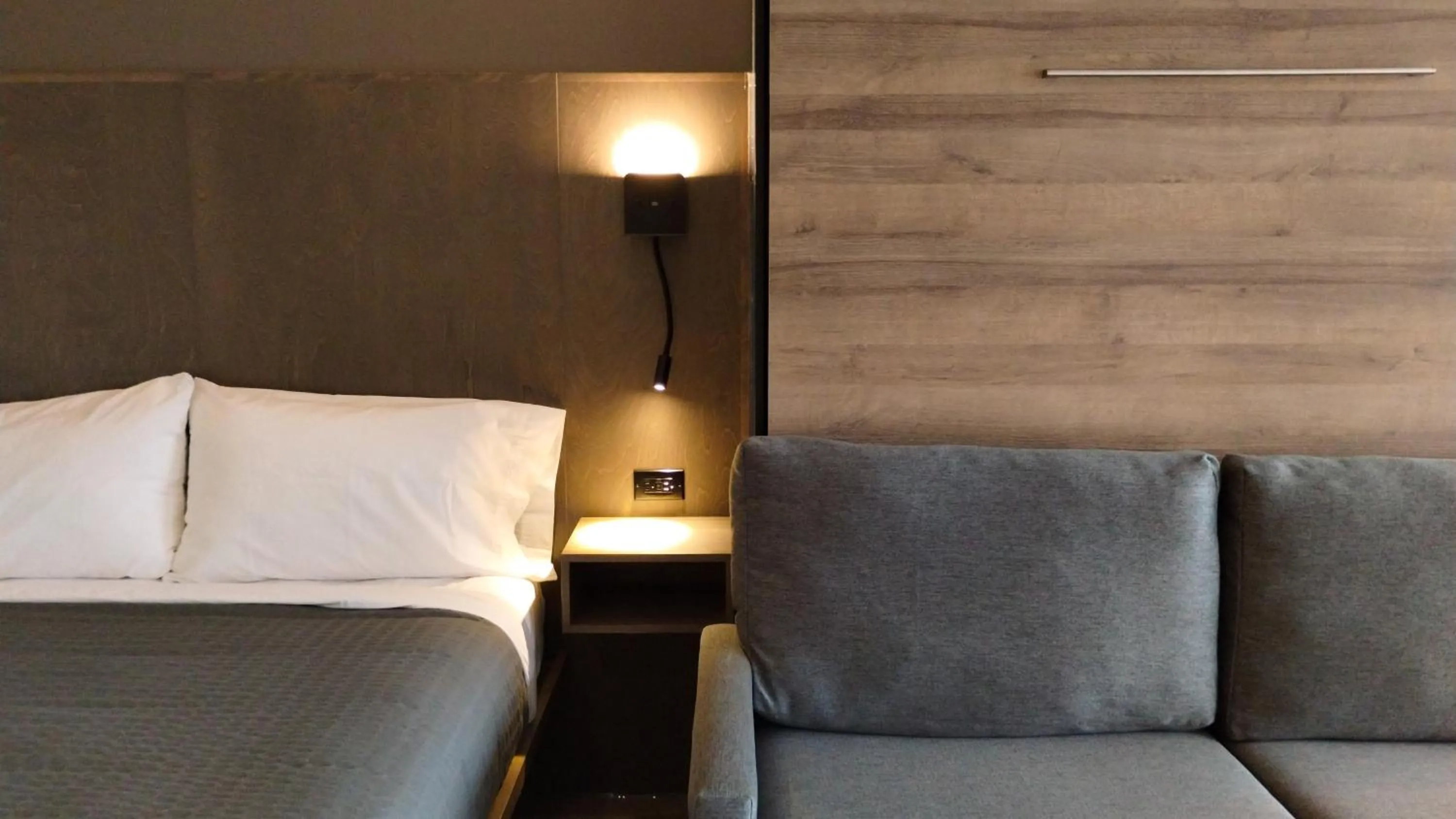 Bed in Motel L'Avenue du Pont