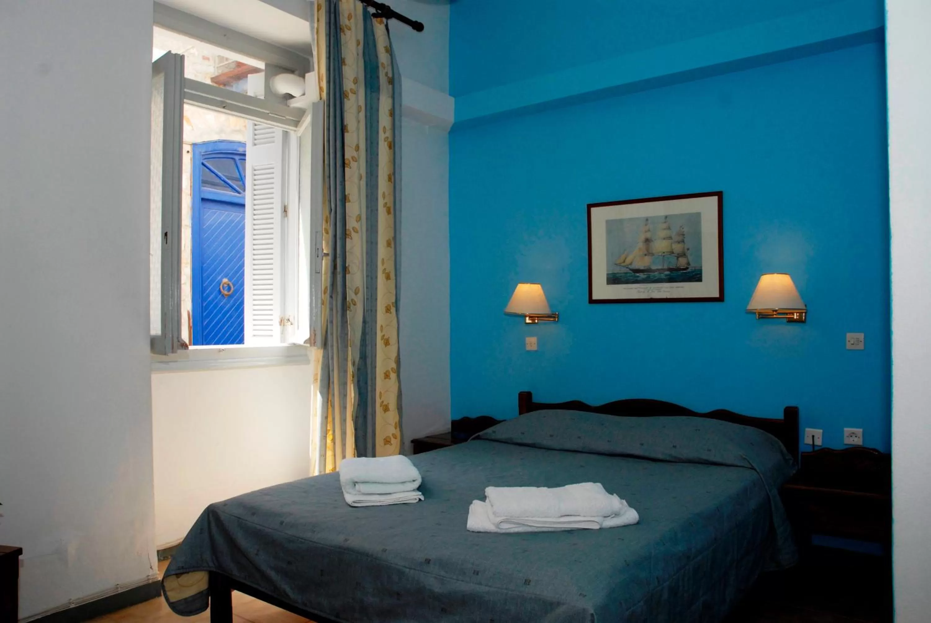 Bed in Amaryllis Hotel