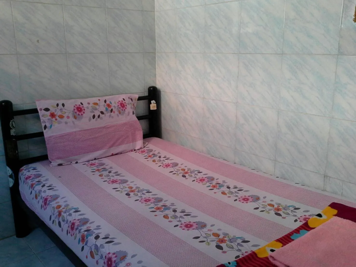 Bed in New Central Guesthouse