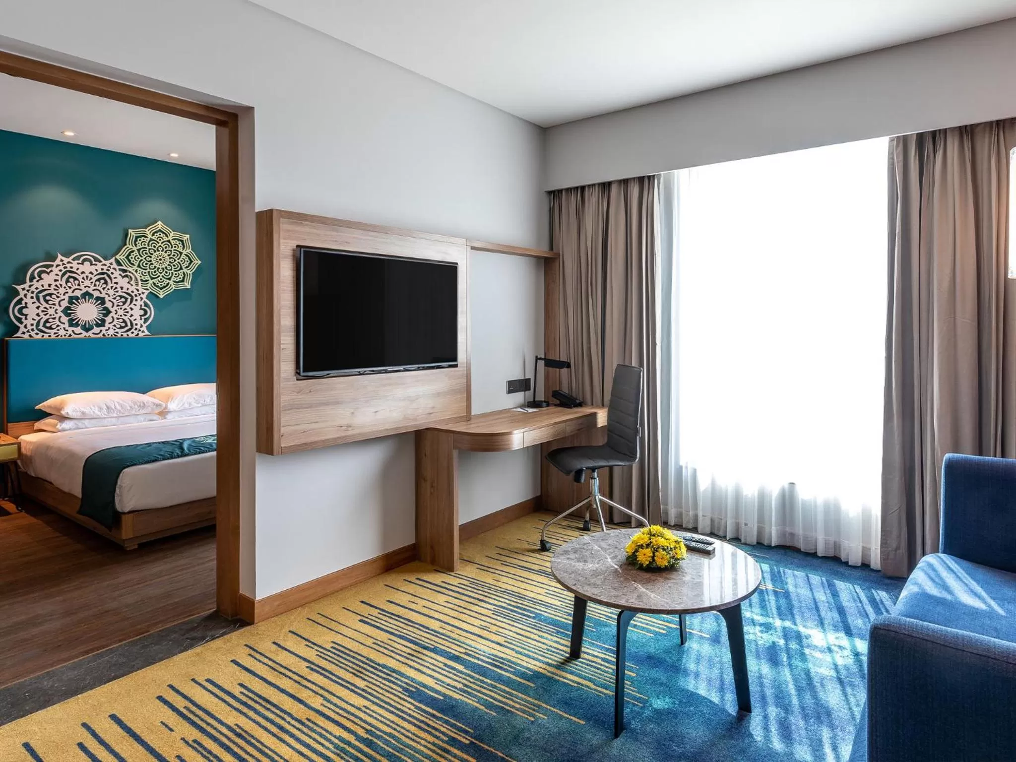 Living room, Bed in Grand Mercure Ahmedabad GIFT City - An Accor Hotels Brand