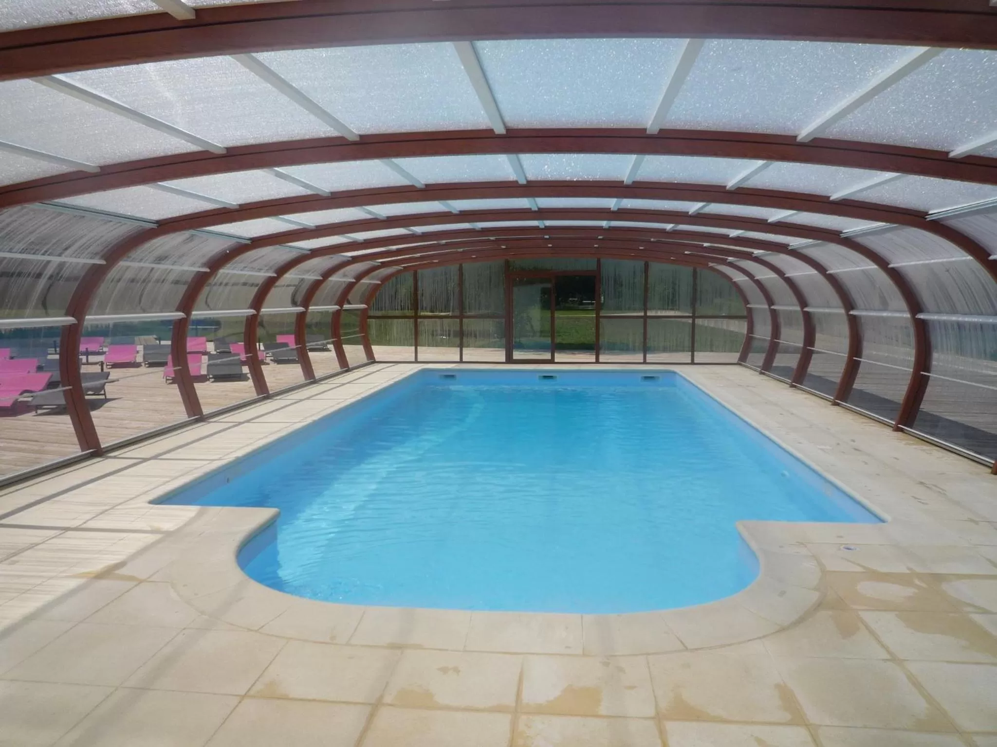 Swimming pool in Le Village de la Champagne - Slowmoov