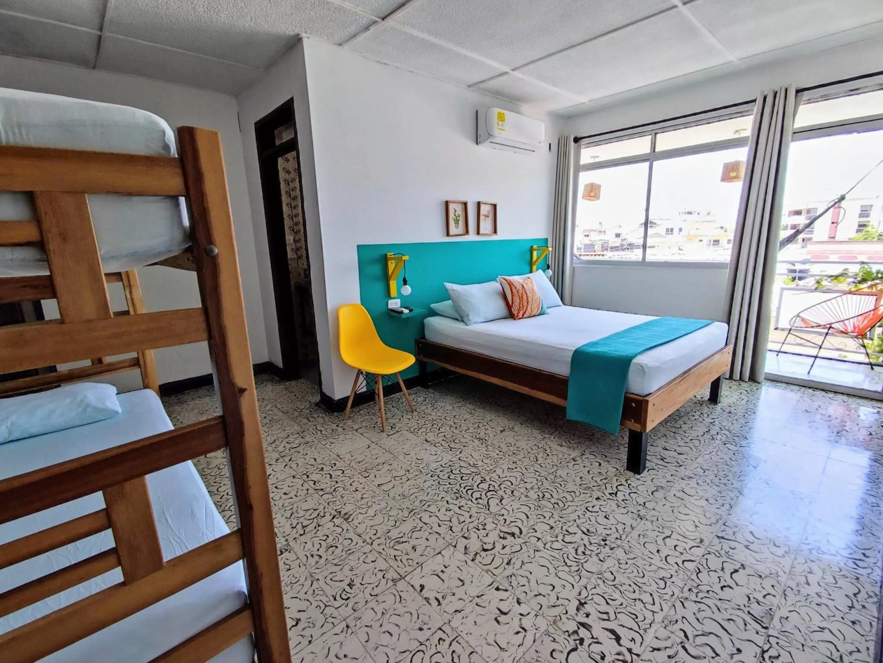 Bed in Bona Vida Hotel