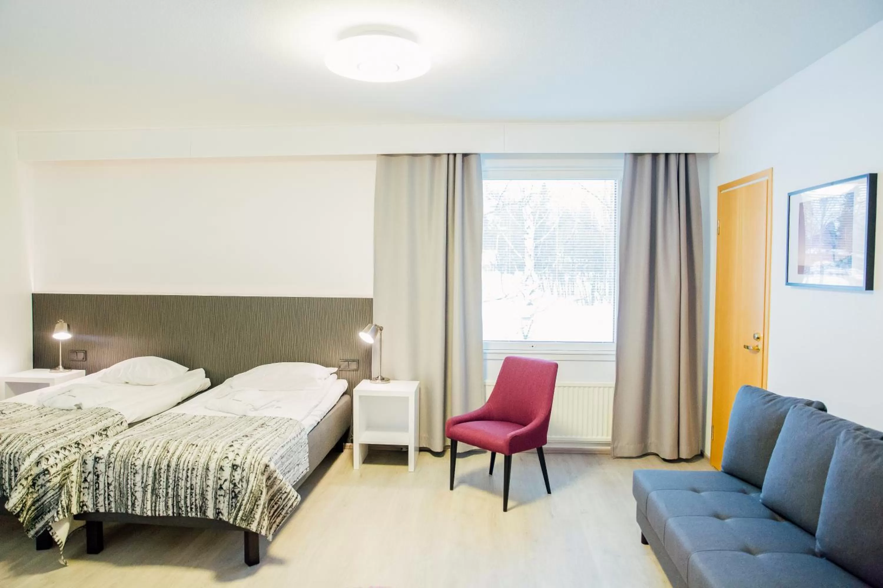 Living room, Bed in Spa Hotel Kunnonpaikka