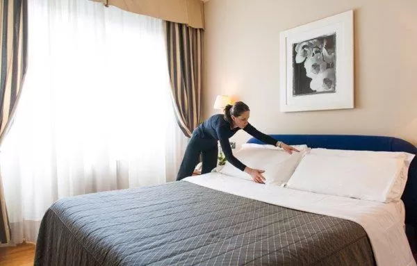 Bed in Cosmo Hotel Torri