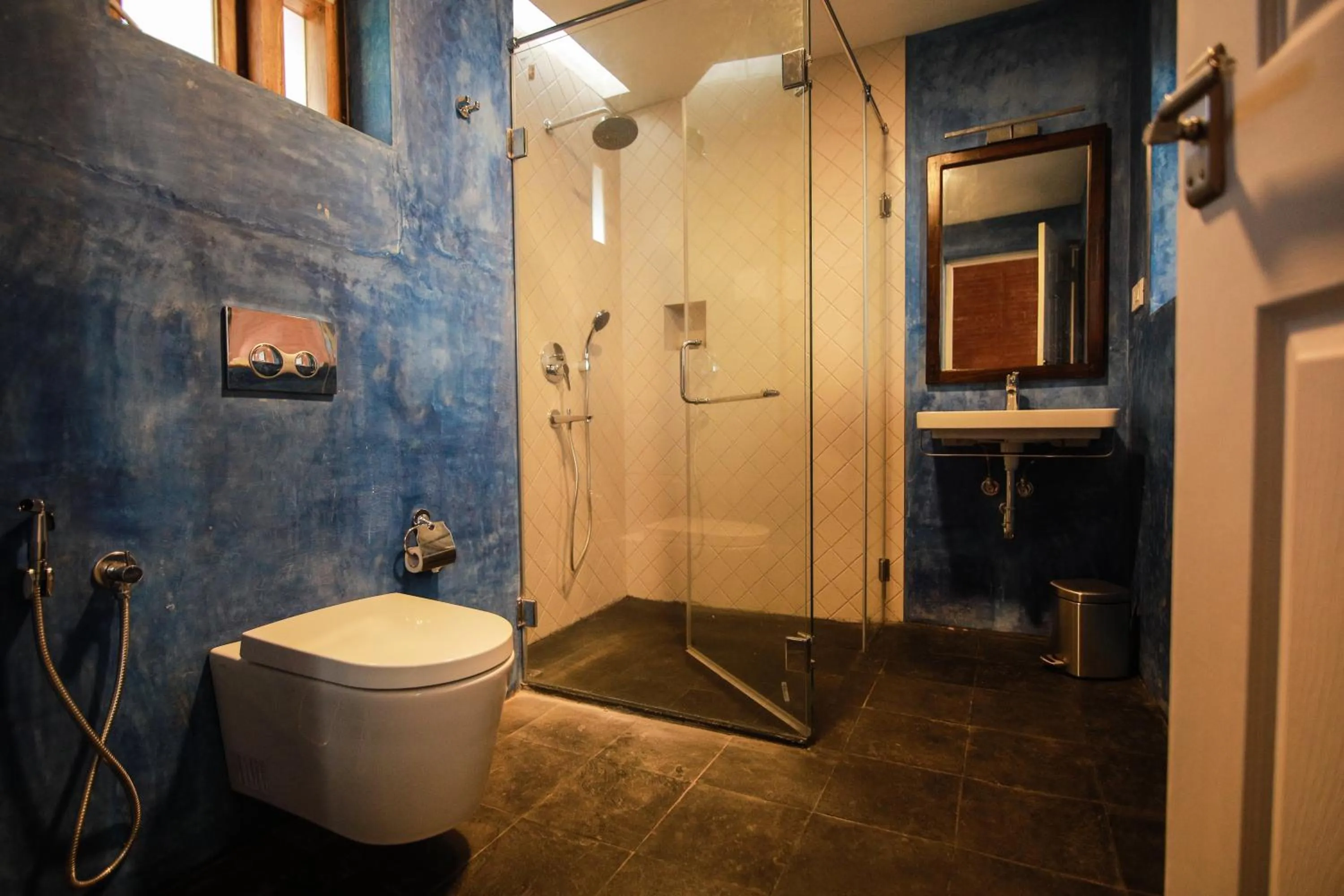 Bathroom in AMARA AYURVEDA RETREAT- Overlooking Evergreen Western Ghats an ecologically sustainable living space in Kovalam