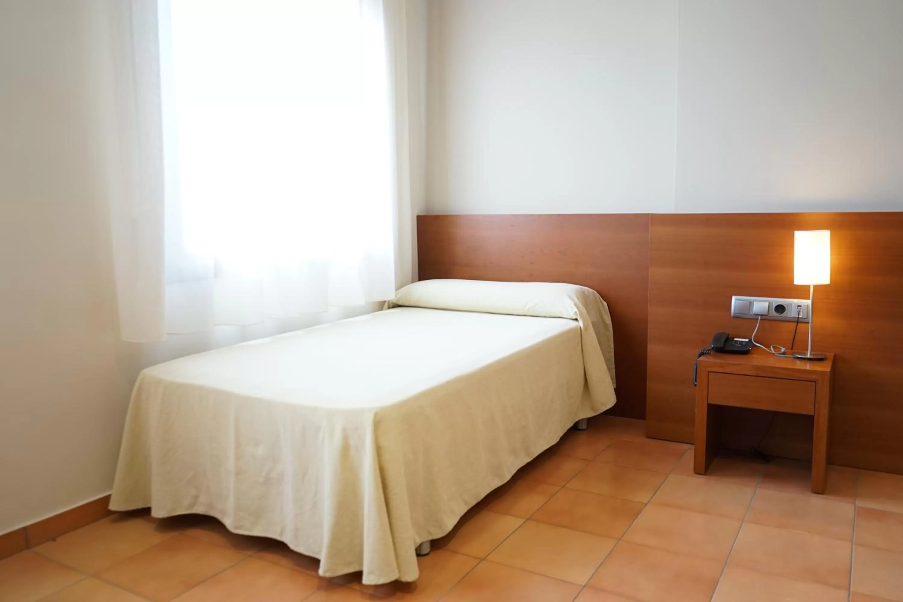 View (from property/room), Bed in Hotel Santuari Balaguer