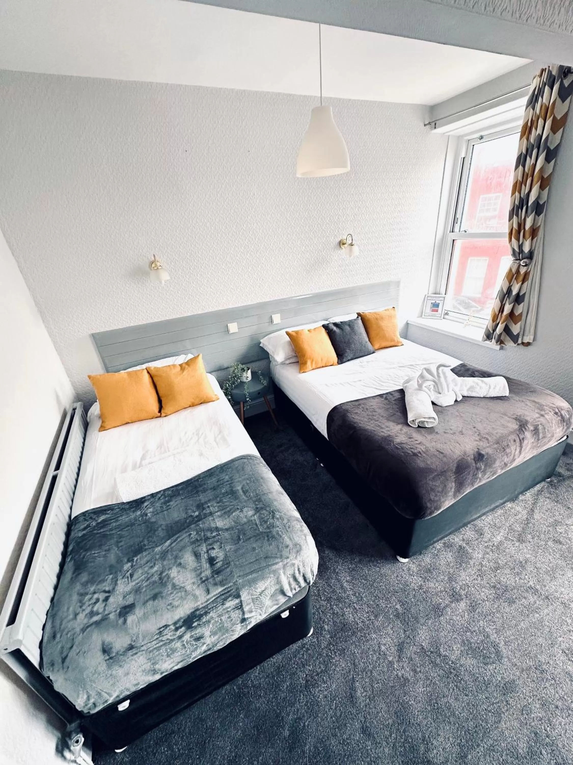 Bed in gwesTY Guest House