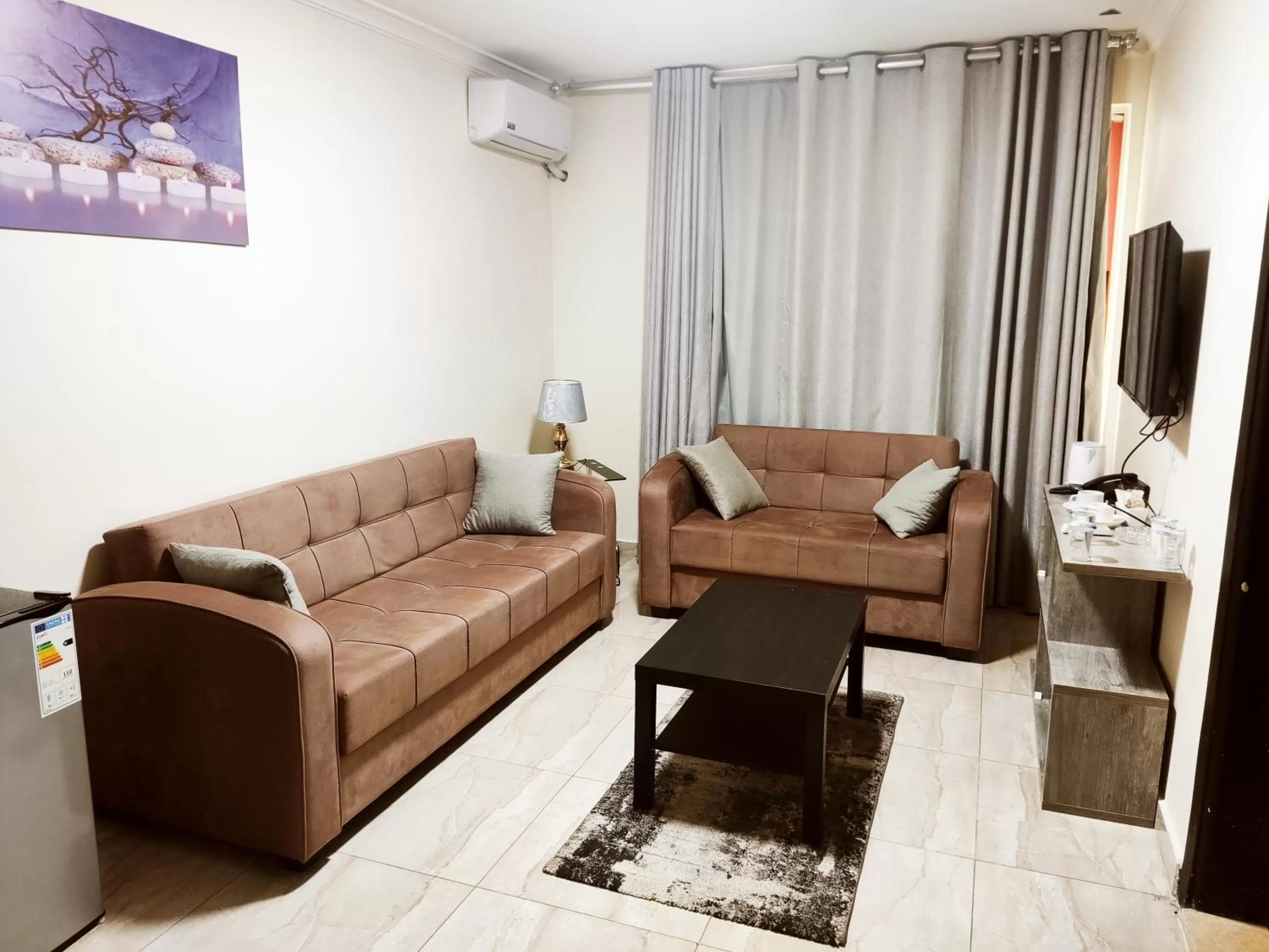 Living room in Golden Plaza Hotel