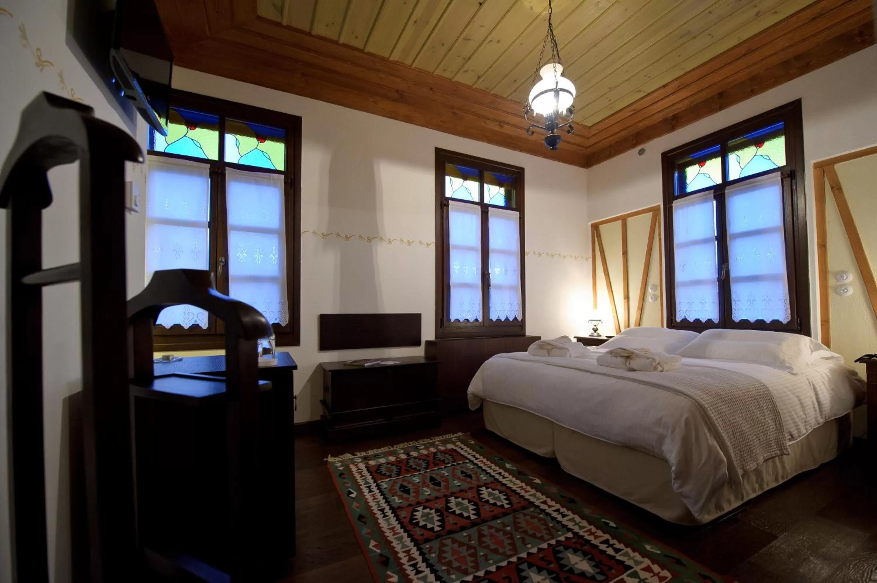 Bed in Orologopoulos Mansion Luxury Hotel