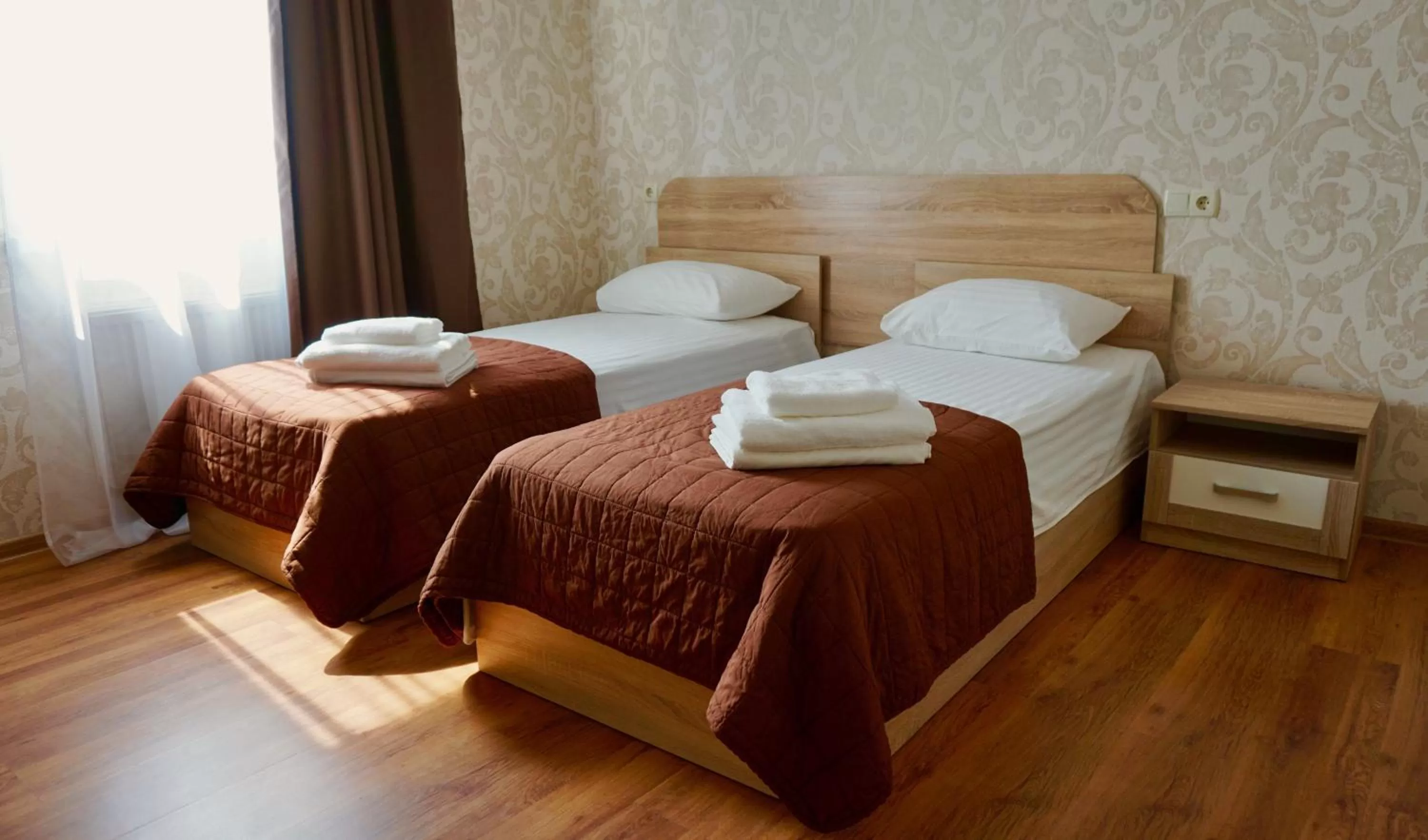 Bed in Zhuliany City Hotel