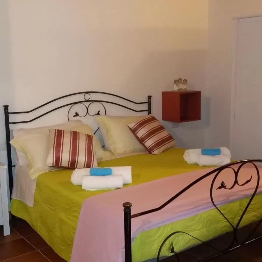 Bed in B&B Le Anthos