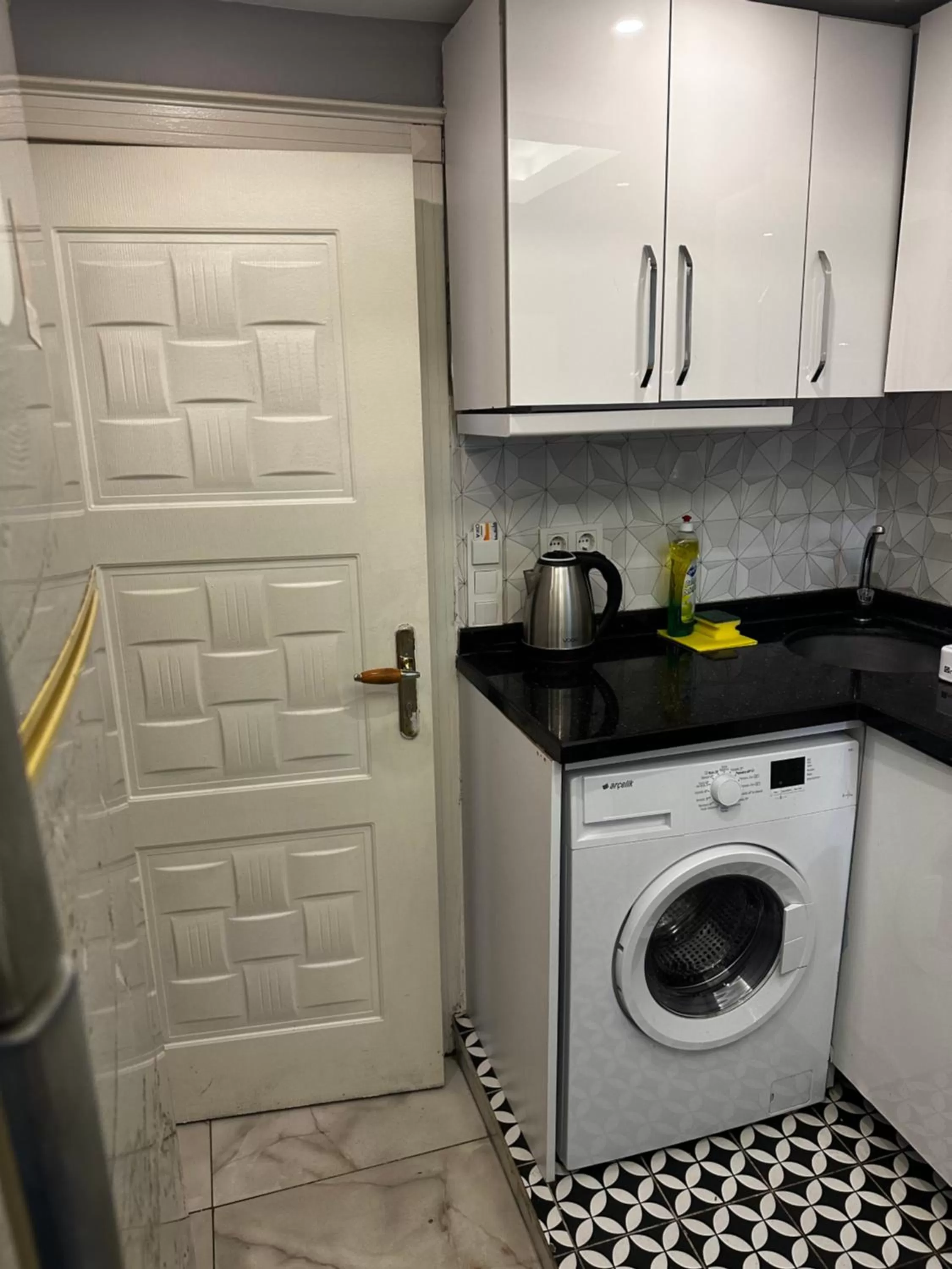 washing machine in Arat Apartments