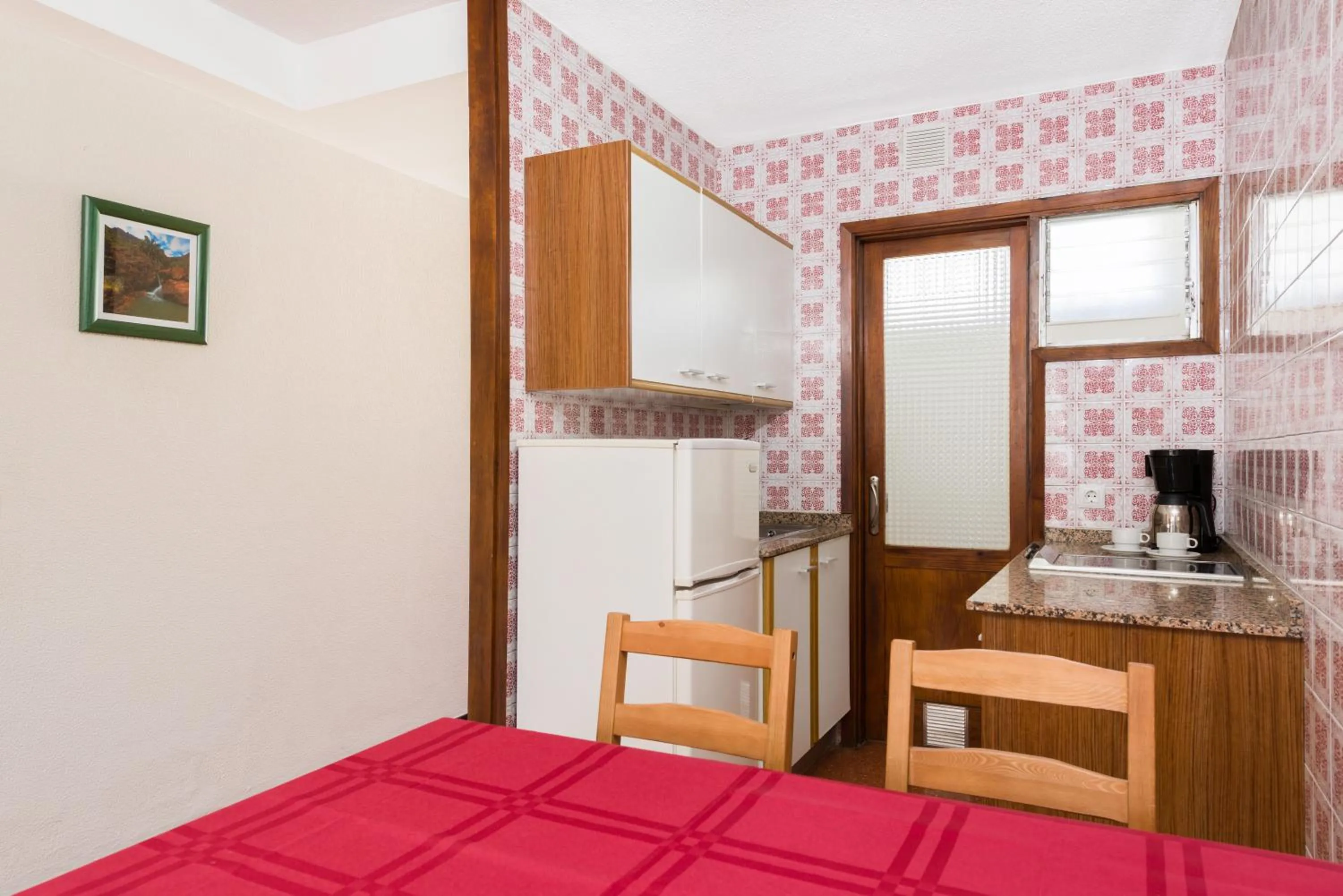 Kitchen or kitchenette in Apartamentos las Góndolas