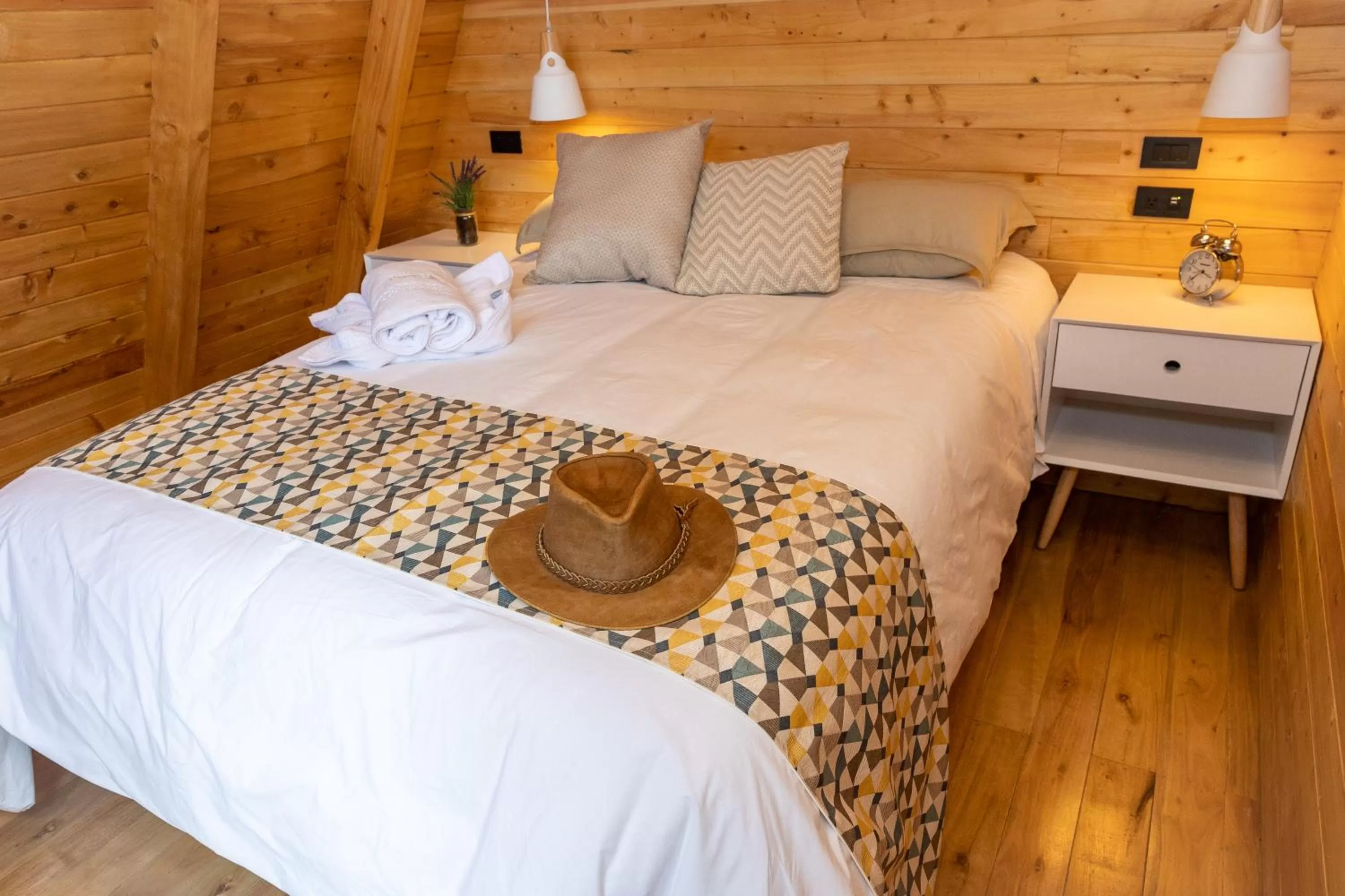 Bed in Hosteria Papagayo Cotopaxi