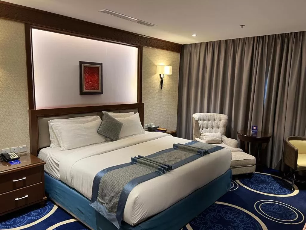 Living room, Bed in Swiss In Tabuk Hotel