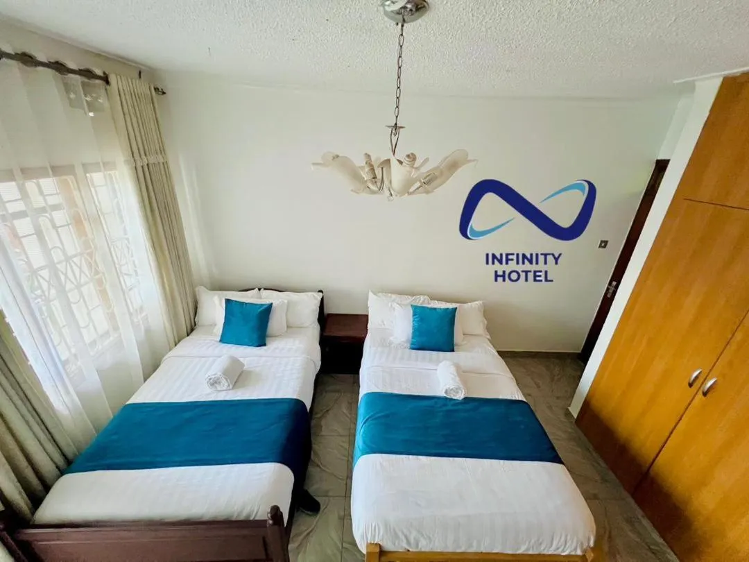 Bed in Infinity Hotel Kampala