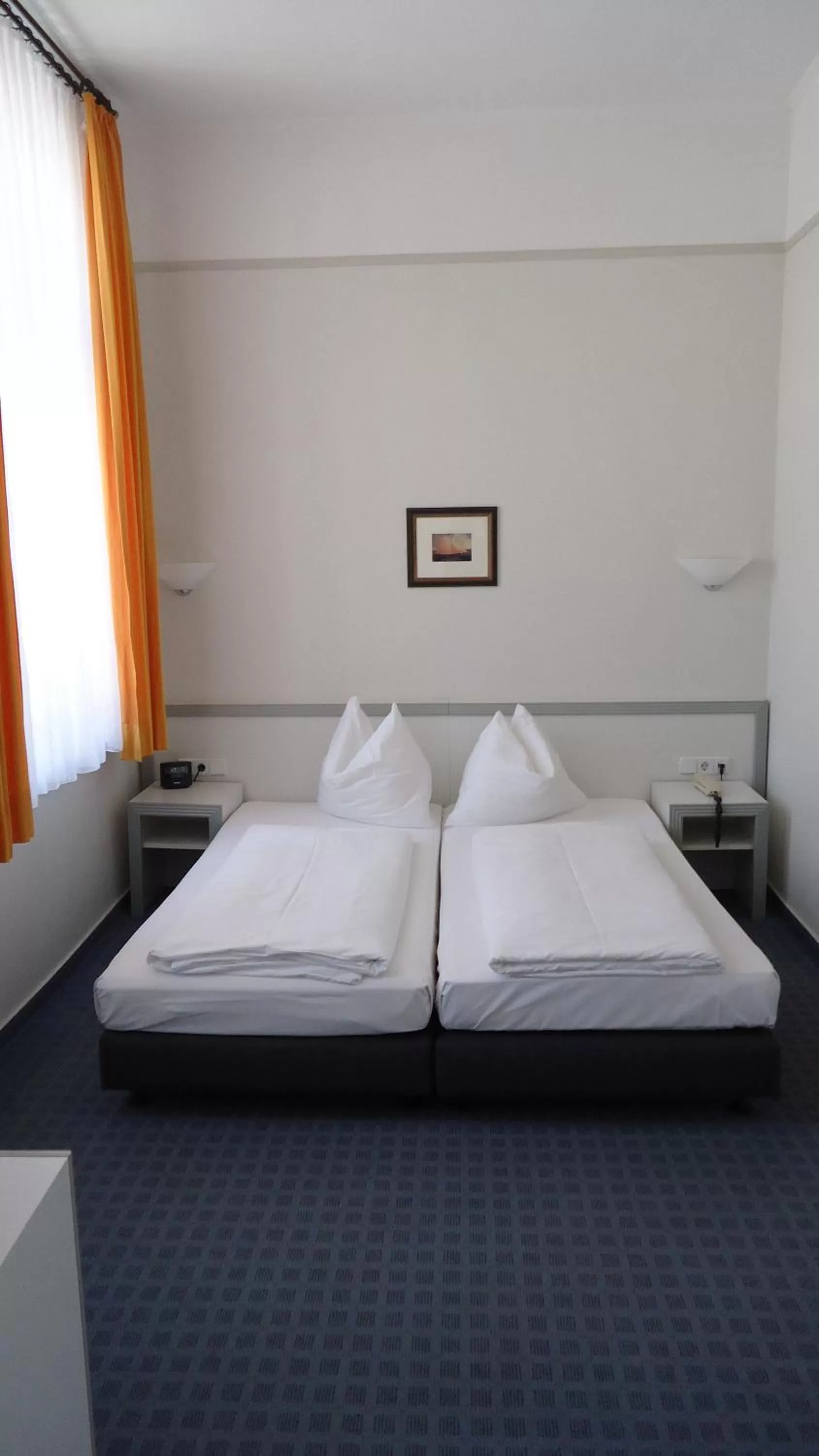 Bed in Hotel Fortuna