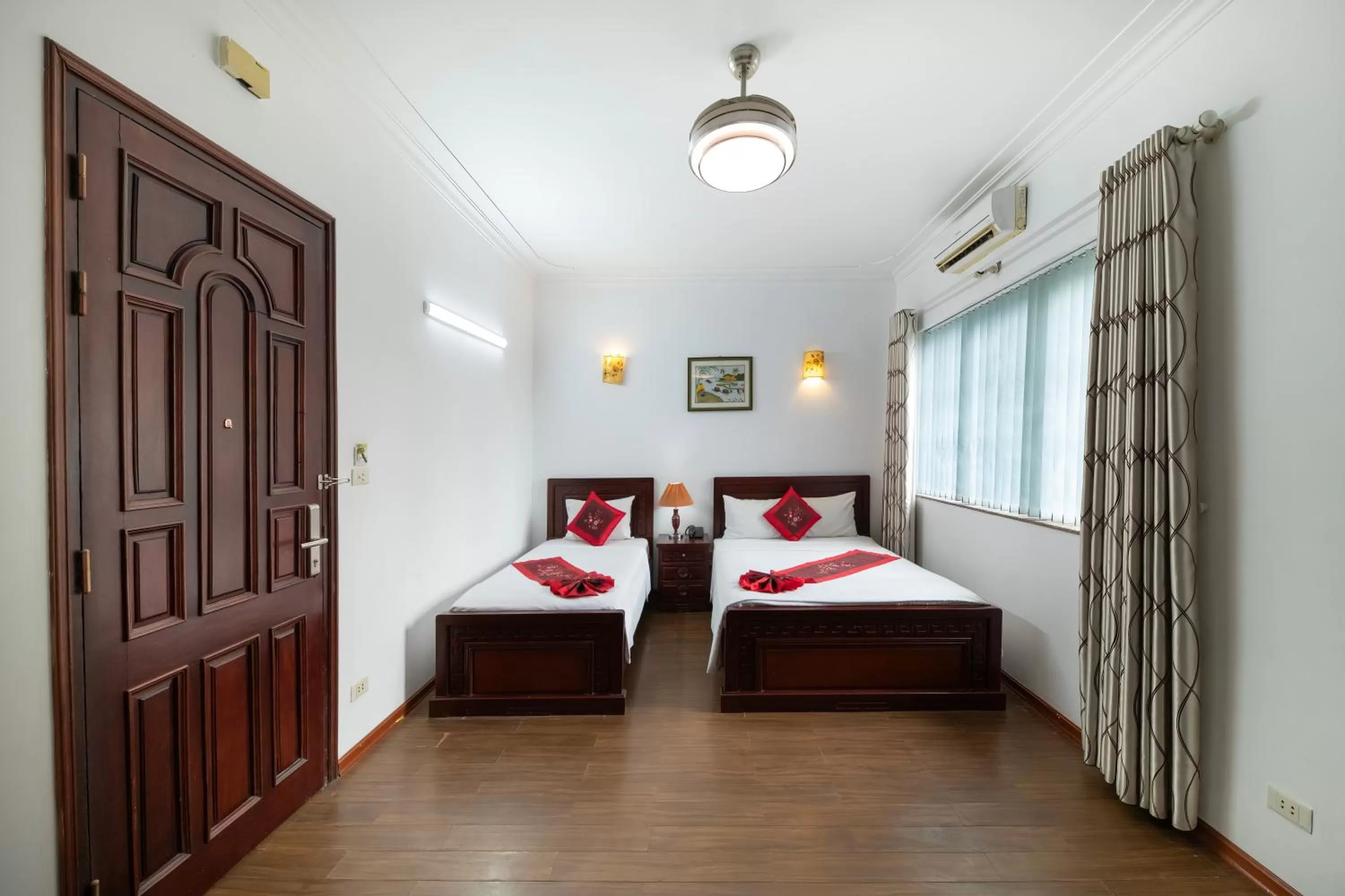 Bed in Phoenix Legend Hotel Hanoi