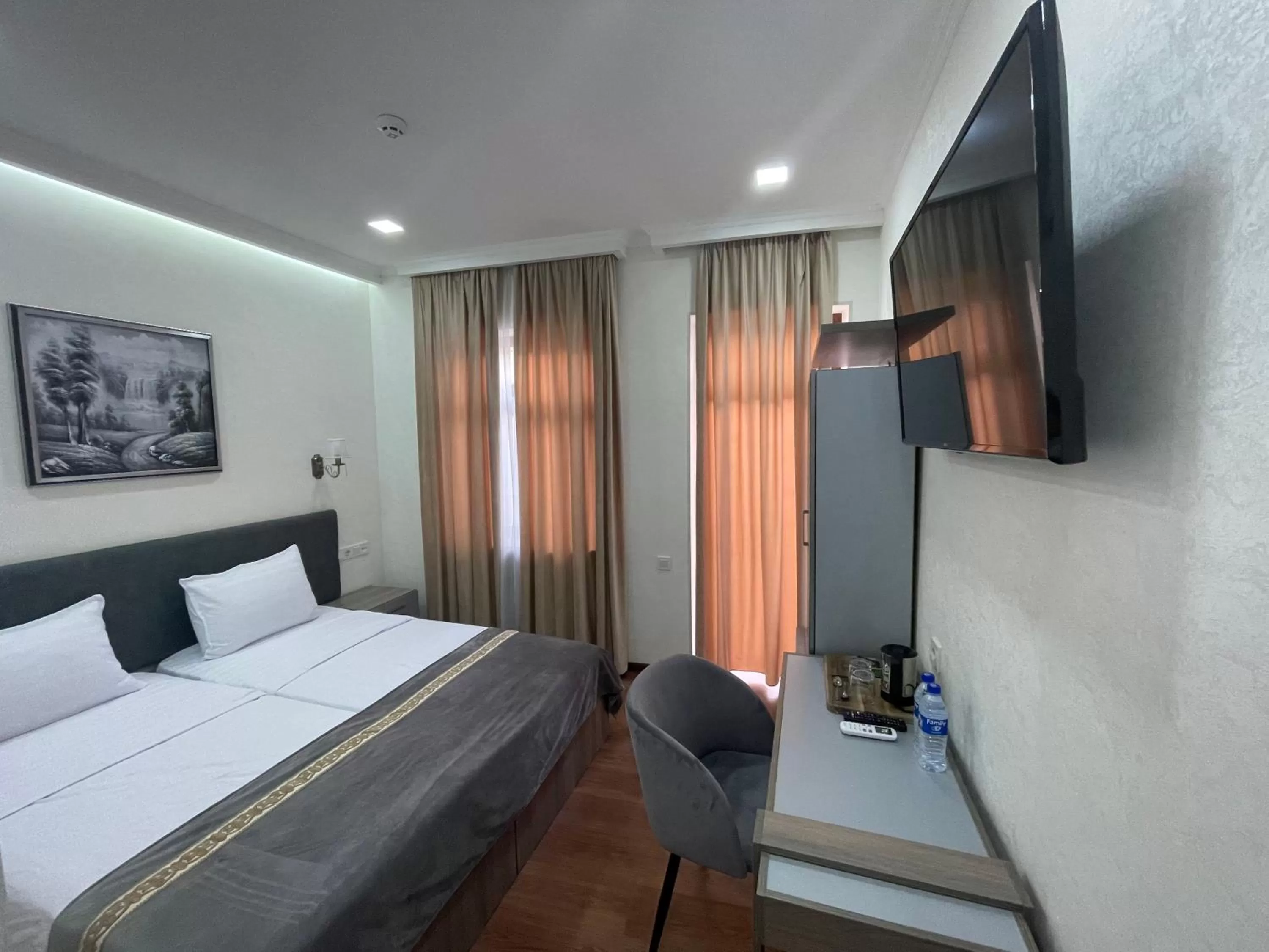 Bed in Registon Saroy Hotel