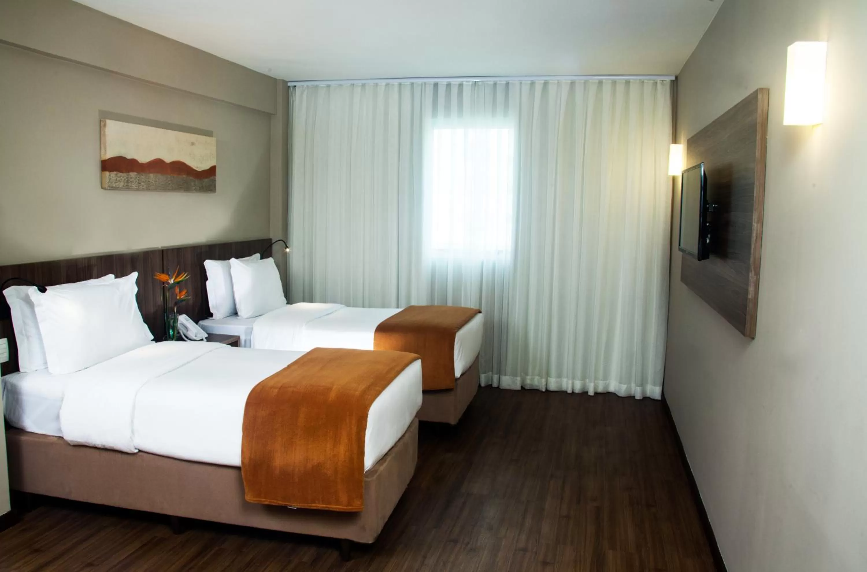 Photo of the whole room, Bed in BH Raja Hotel