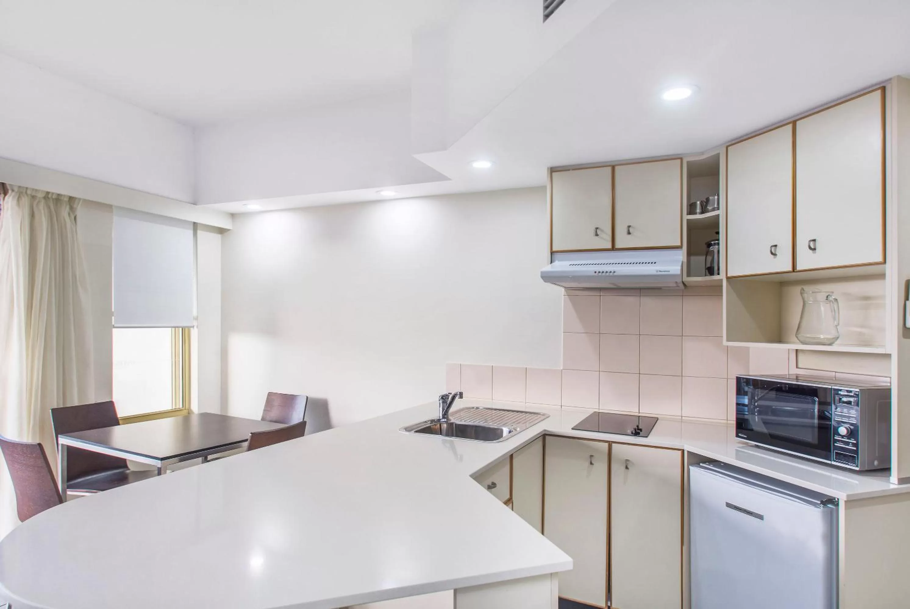 Kitchen or kitchenette in Mantra French Quarter Noosa