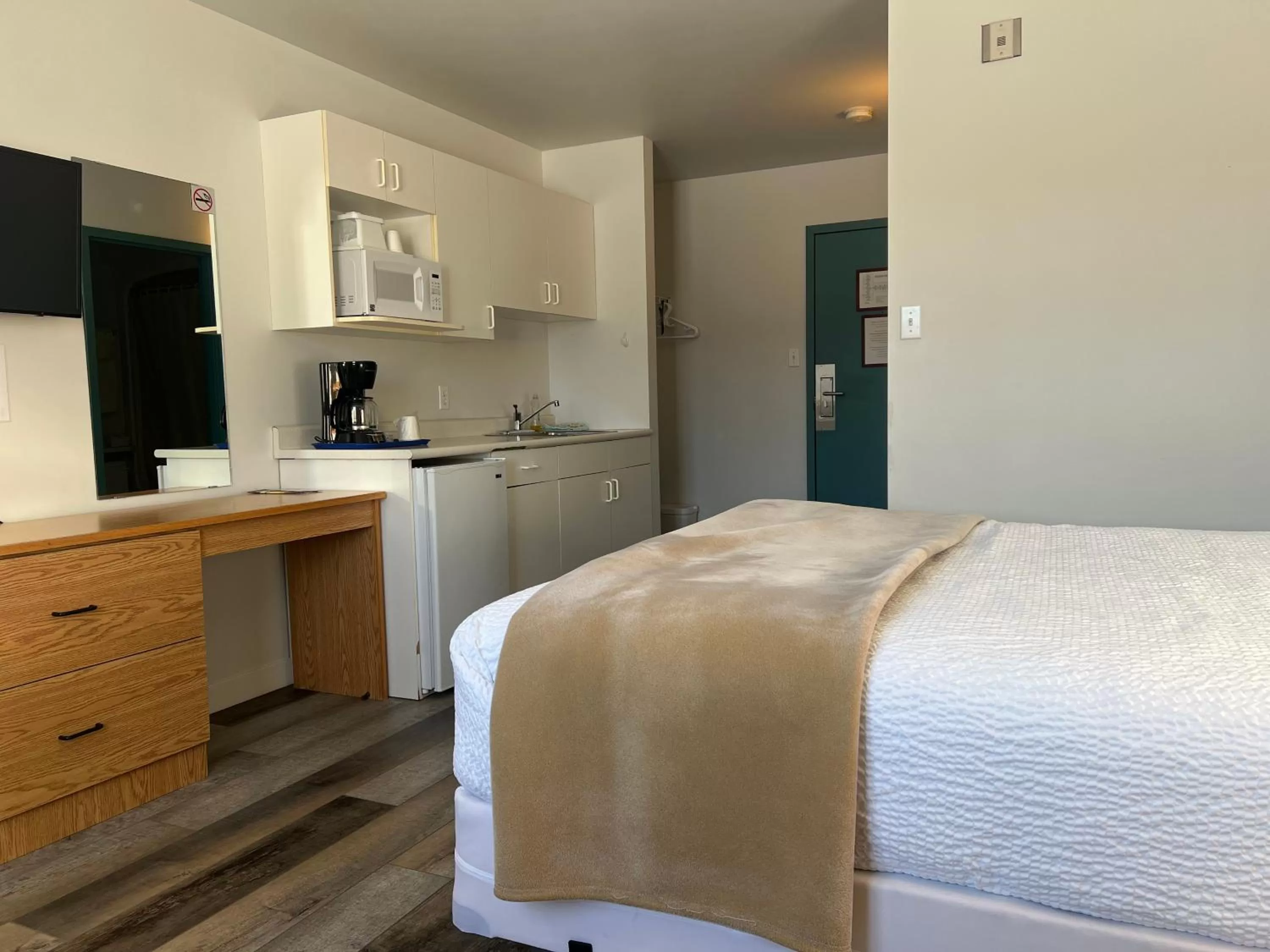 Bed in Sleep Suite Motel