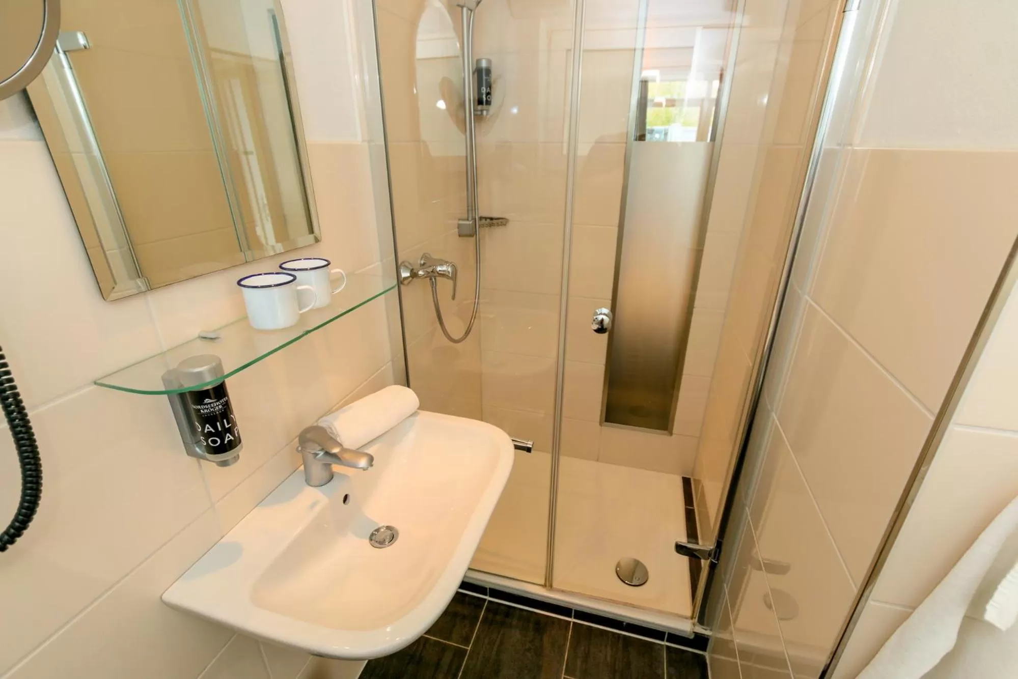 Bathroom in Nordseehotel Kröger