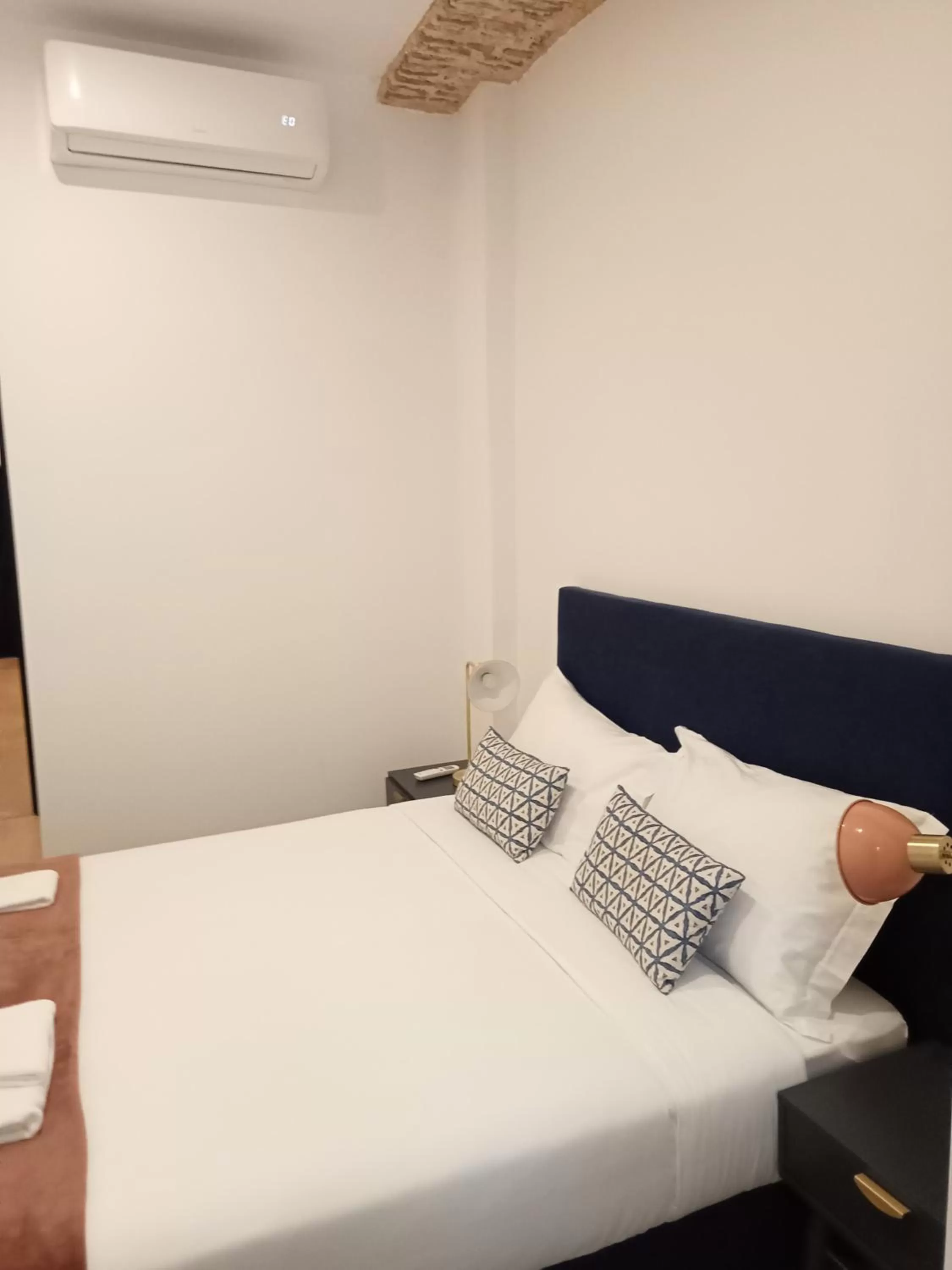 Bed in Succeed Terreiro do Paço Suites