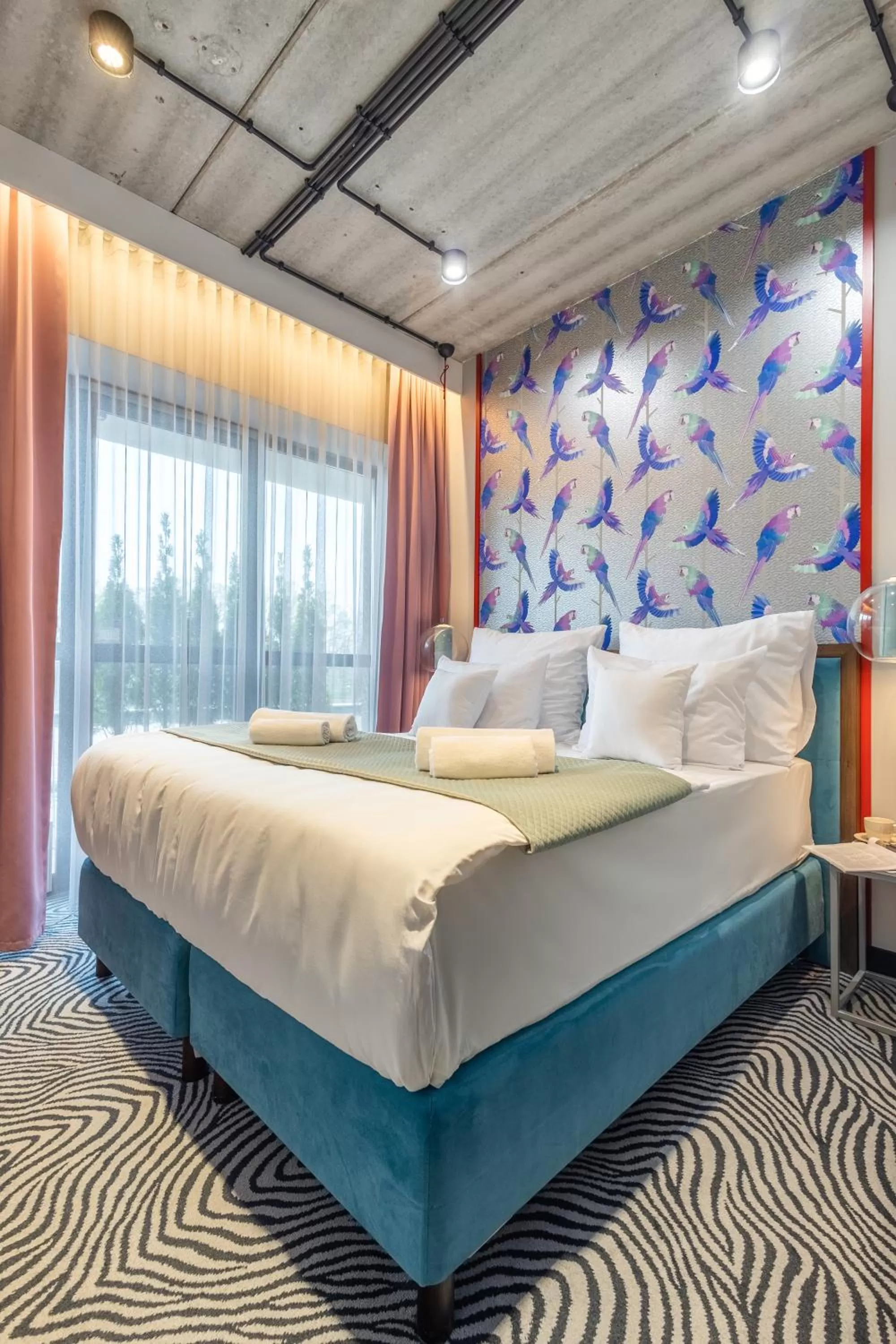 Bed in Hotel Zoo by Afrykarium Wroclaw