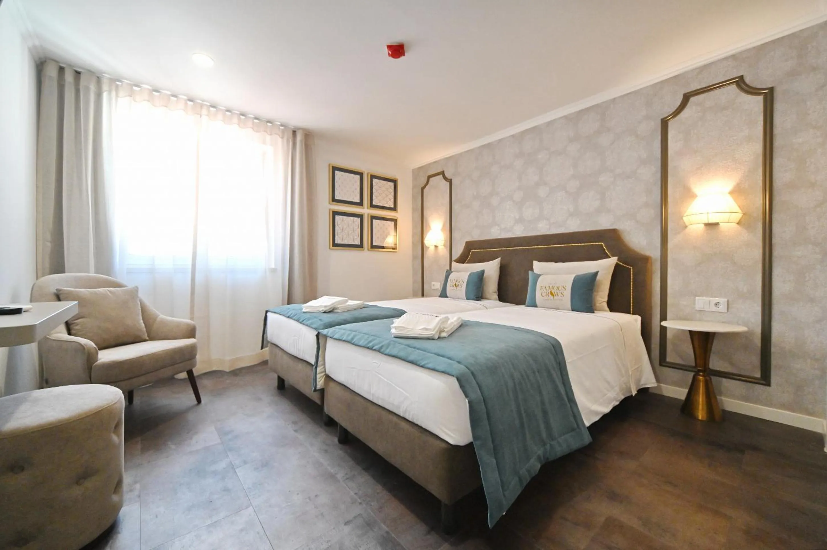 Bed in Famous Crows Lisbon Suites