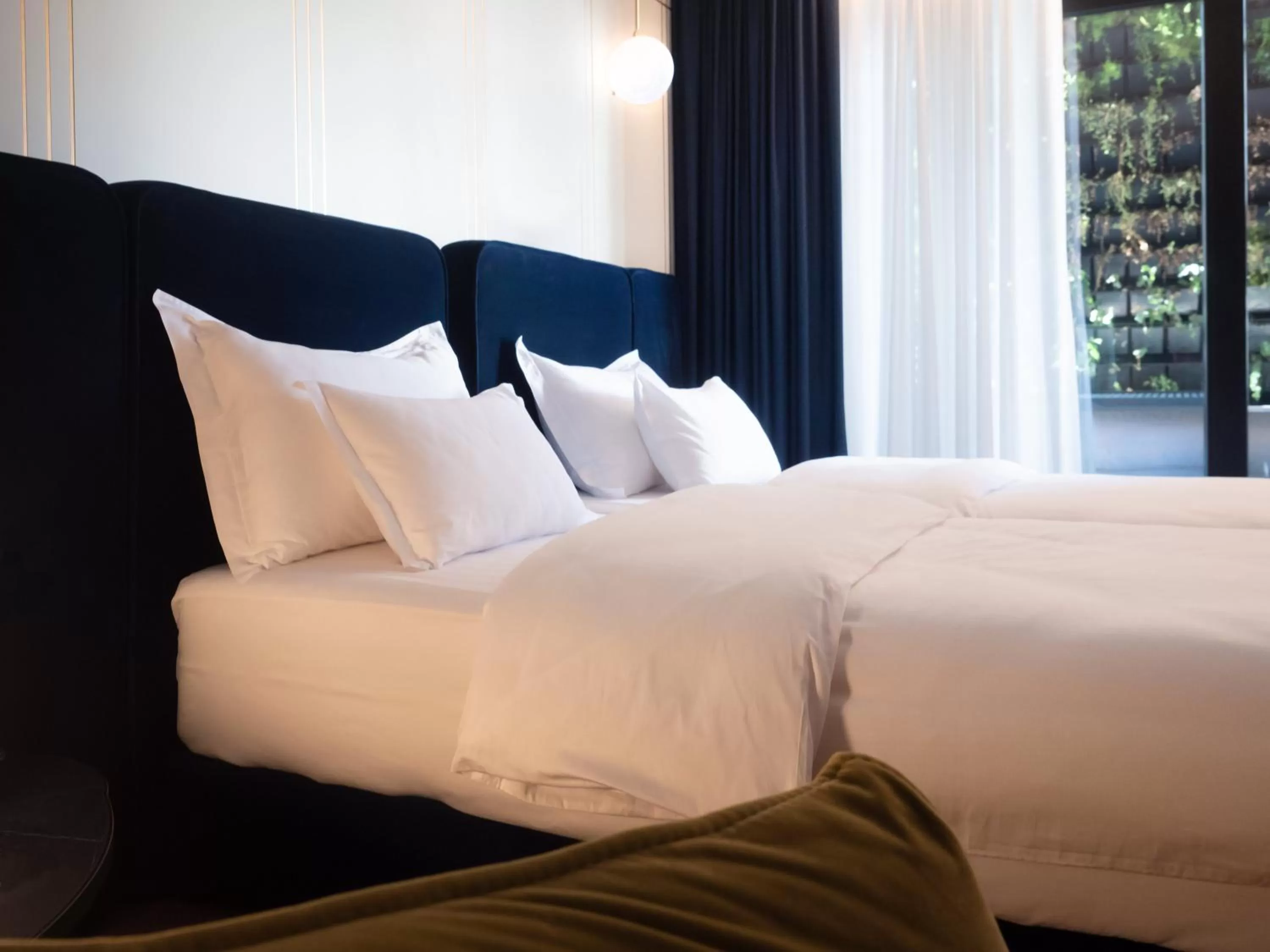 Bed in Moncafe Boutique Hotel & SPA Tirana