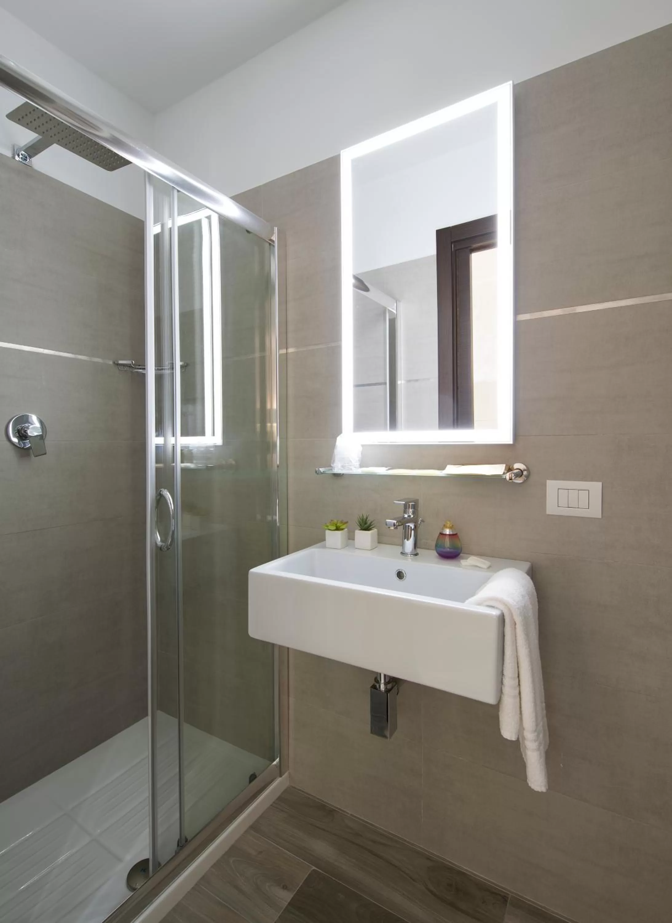 Bathroom in Oasi Village Hotel