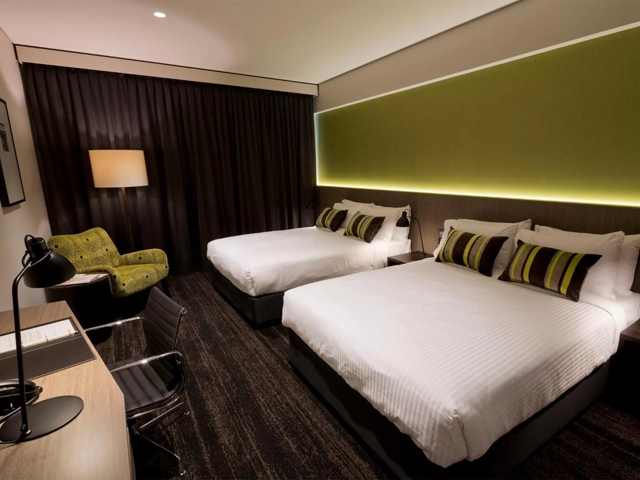 Bed in The Glen Hotel and Suites