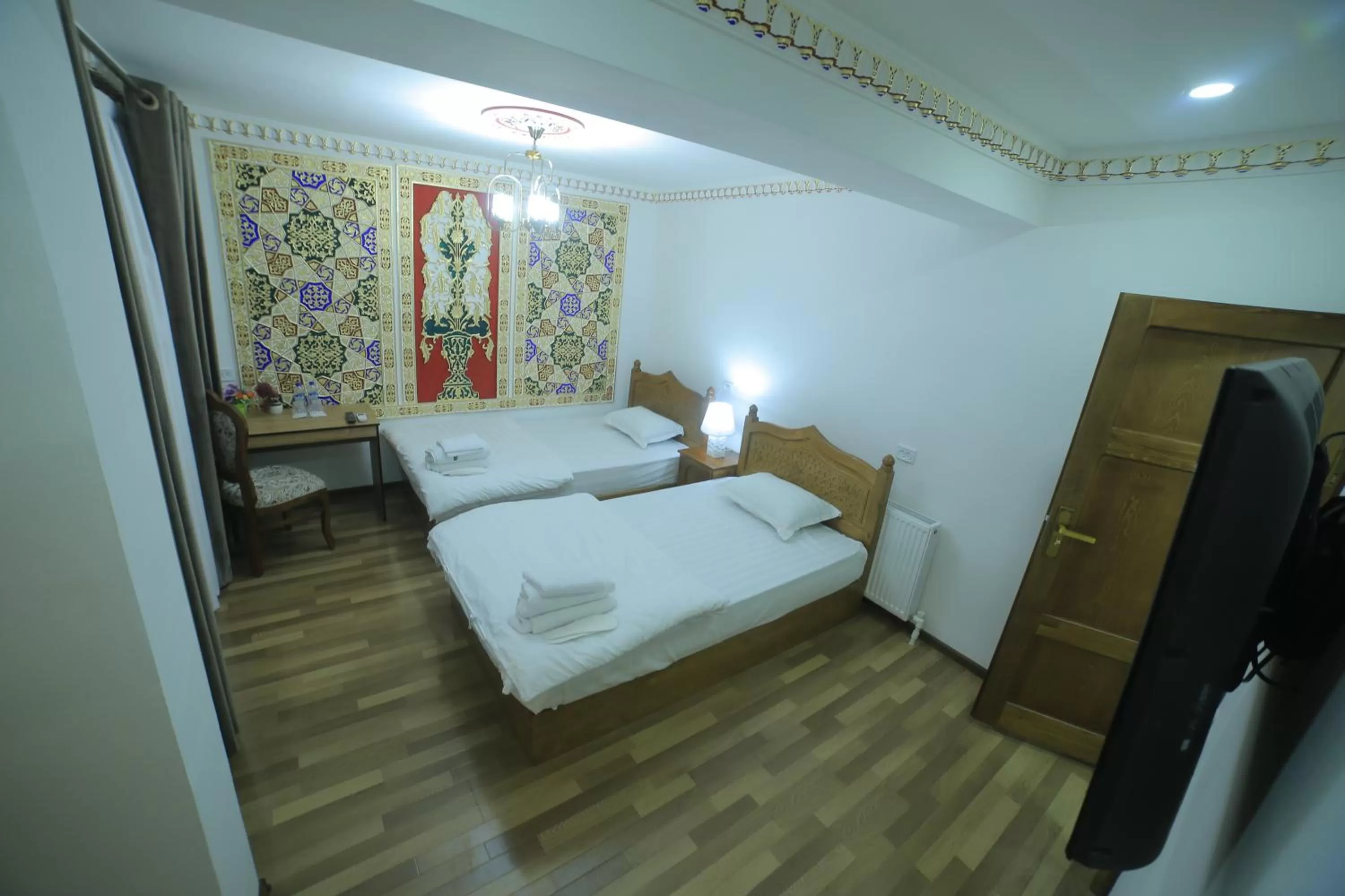 Bed in Bukhara Baraka Boutique Hotel