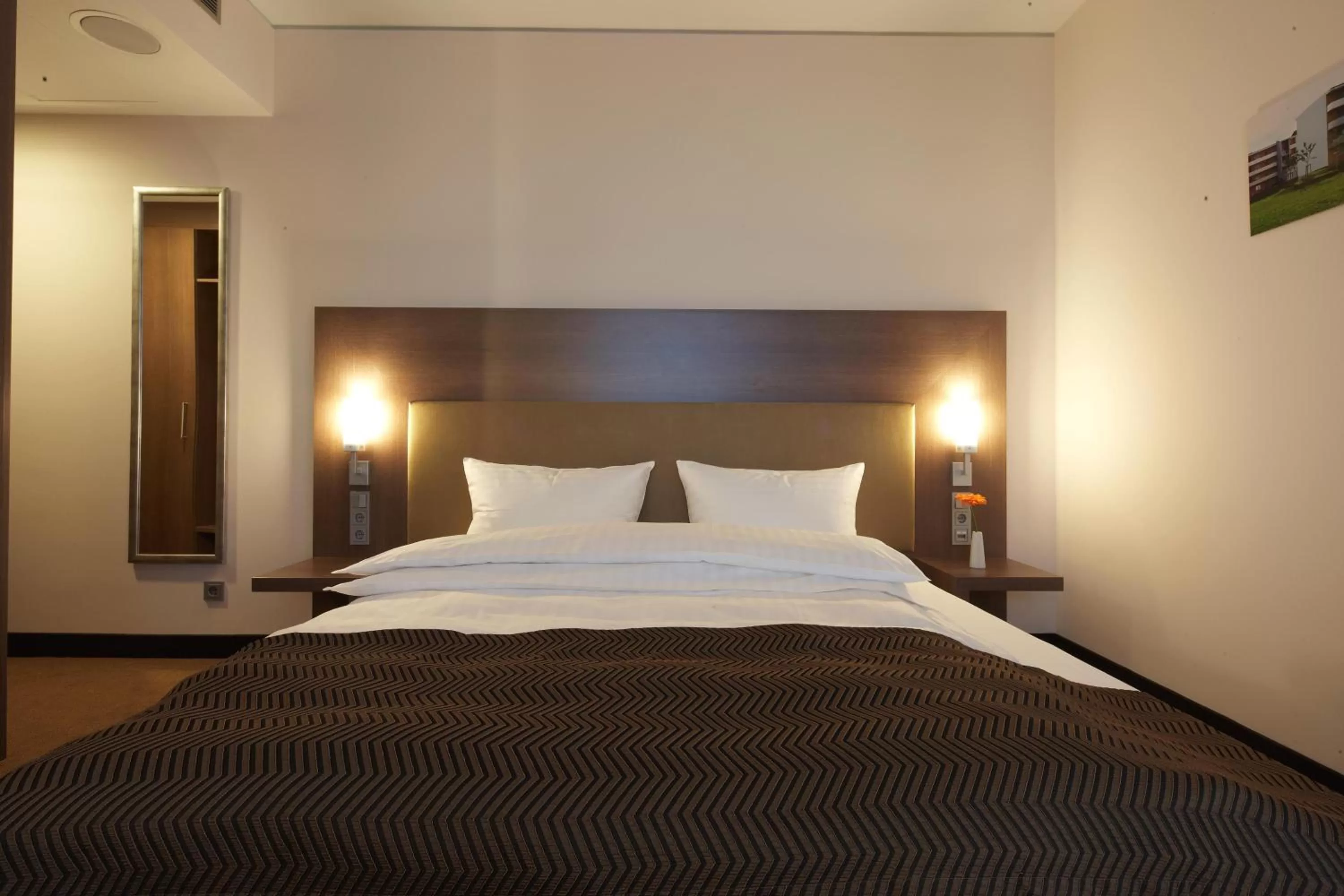 Photo of the whole room, Bed in IntercityHotel Mannheim